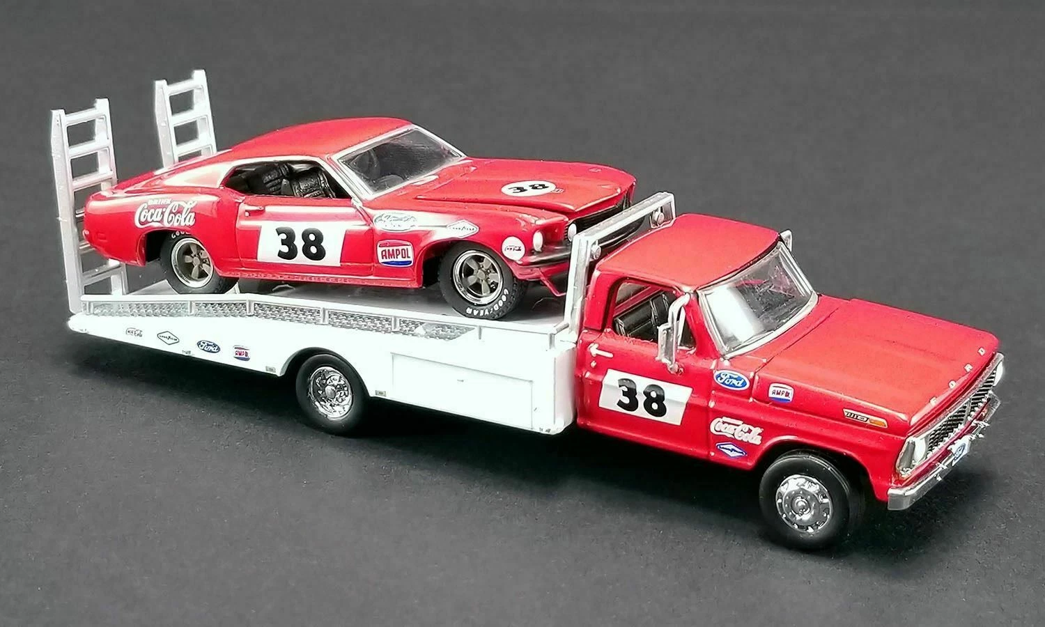 Acme | 51269 | 1/64 1969 allan moffat racing trans am mustang #38 on a ford f-350 ramp truck.