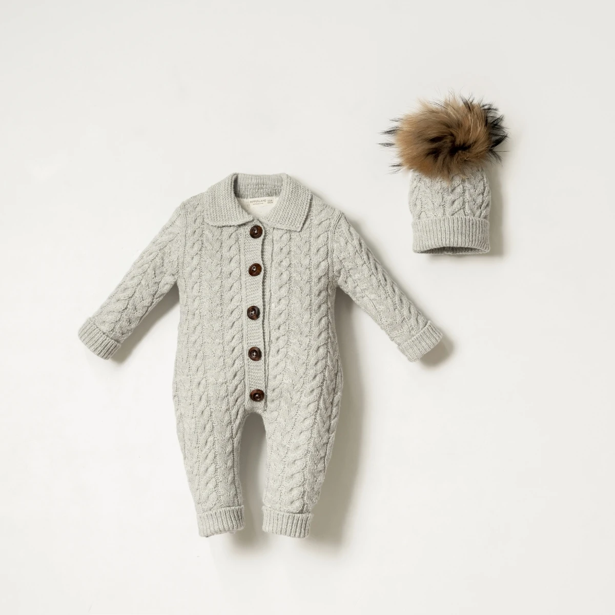 NİPPERLAND UNISEX 3-6-9-12 AY ŞAPKALI TULUM