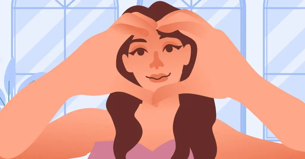 Elleriyle kalp işareti yaparak kendini sevmeyi (self-love) ve umudu simgeleyen mutlu kadın portresi.