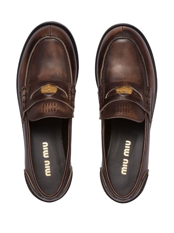 Miu Miu embossed leather penny loafers