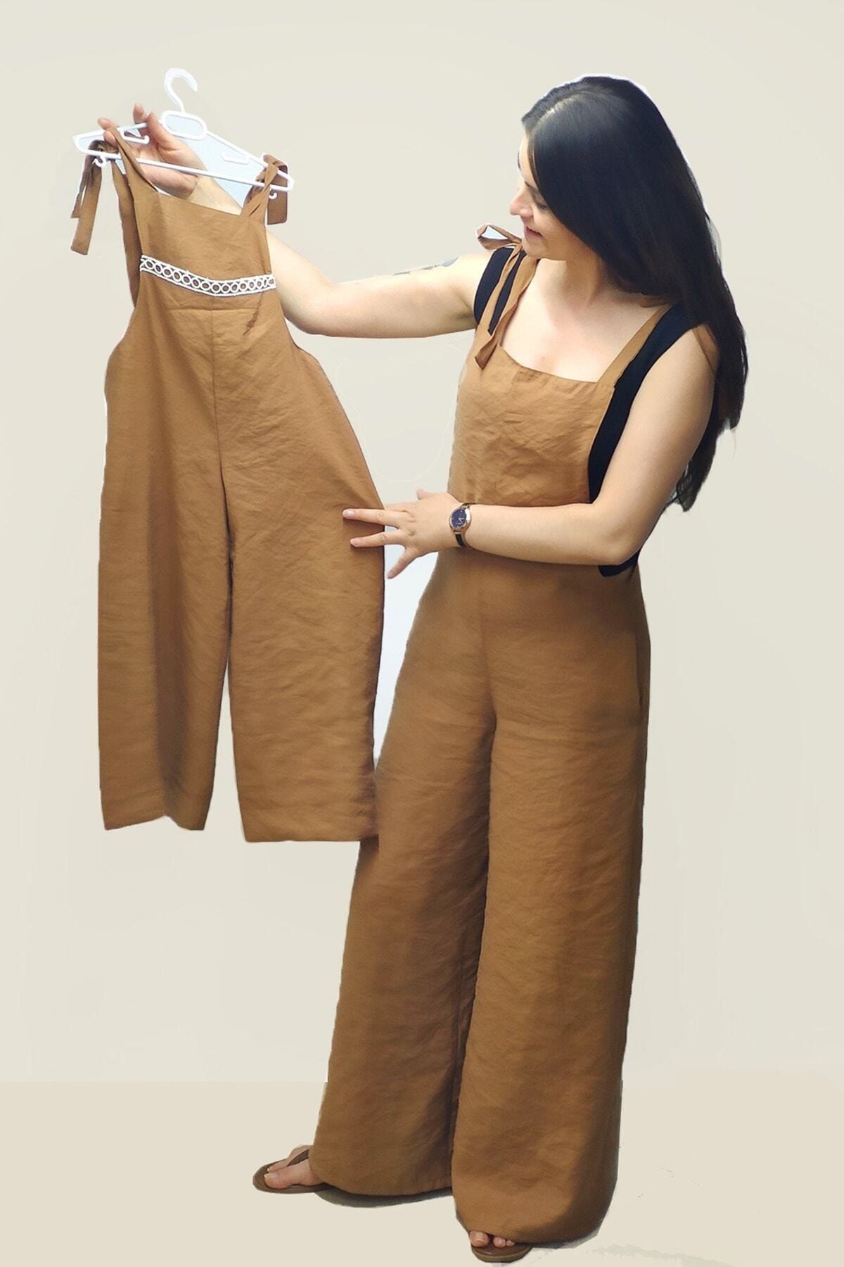 Mädchen-Jumpsuit mit Spitzendetail und Vordertasche, 4–8 Jahre