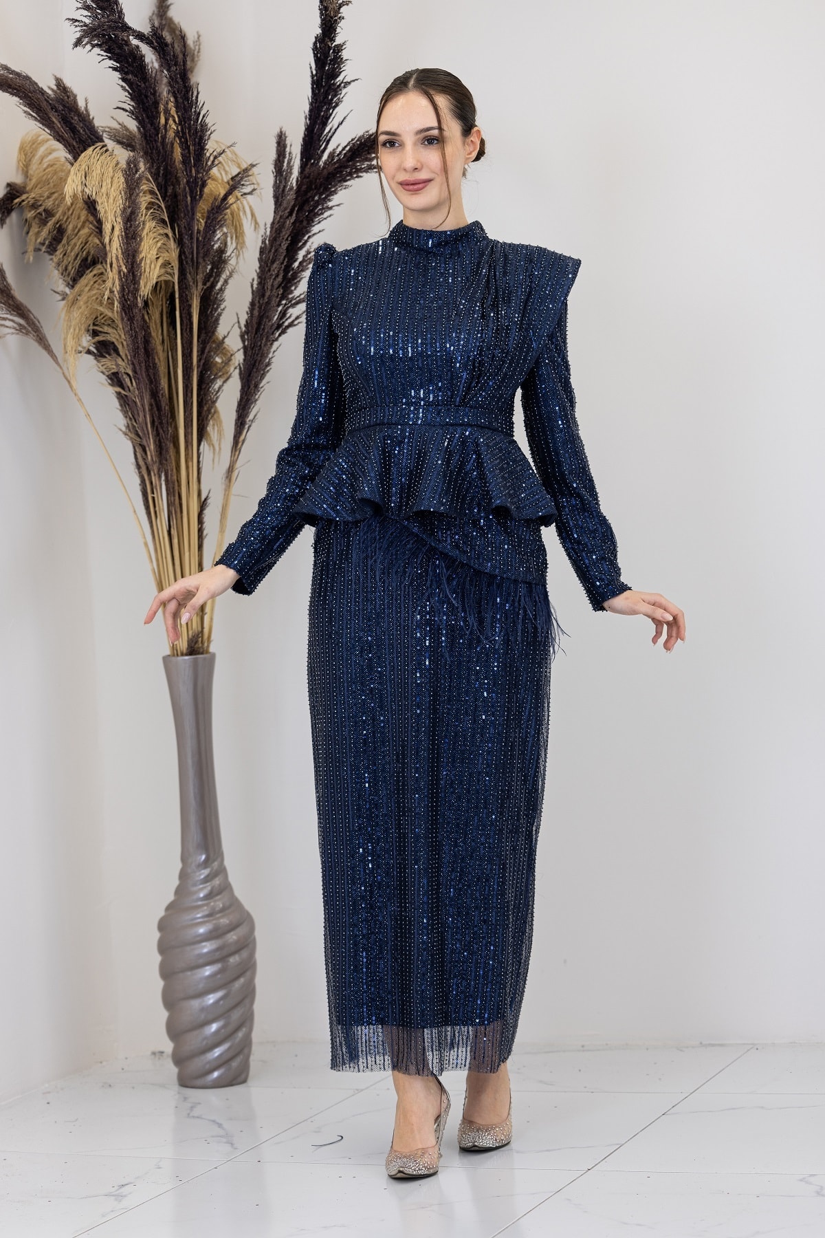 Pamira Evening Dress with Peplum Detail and Ostrich Feather