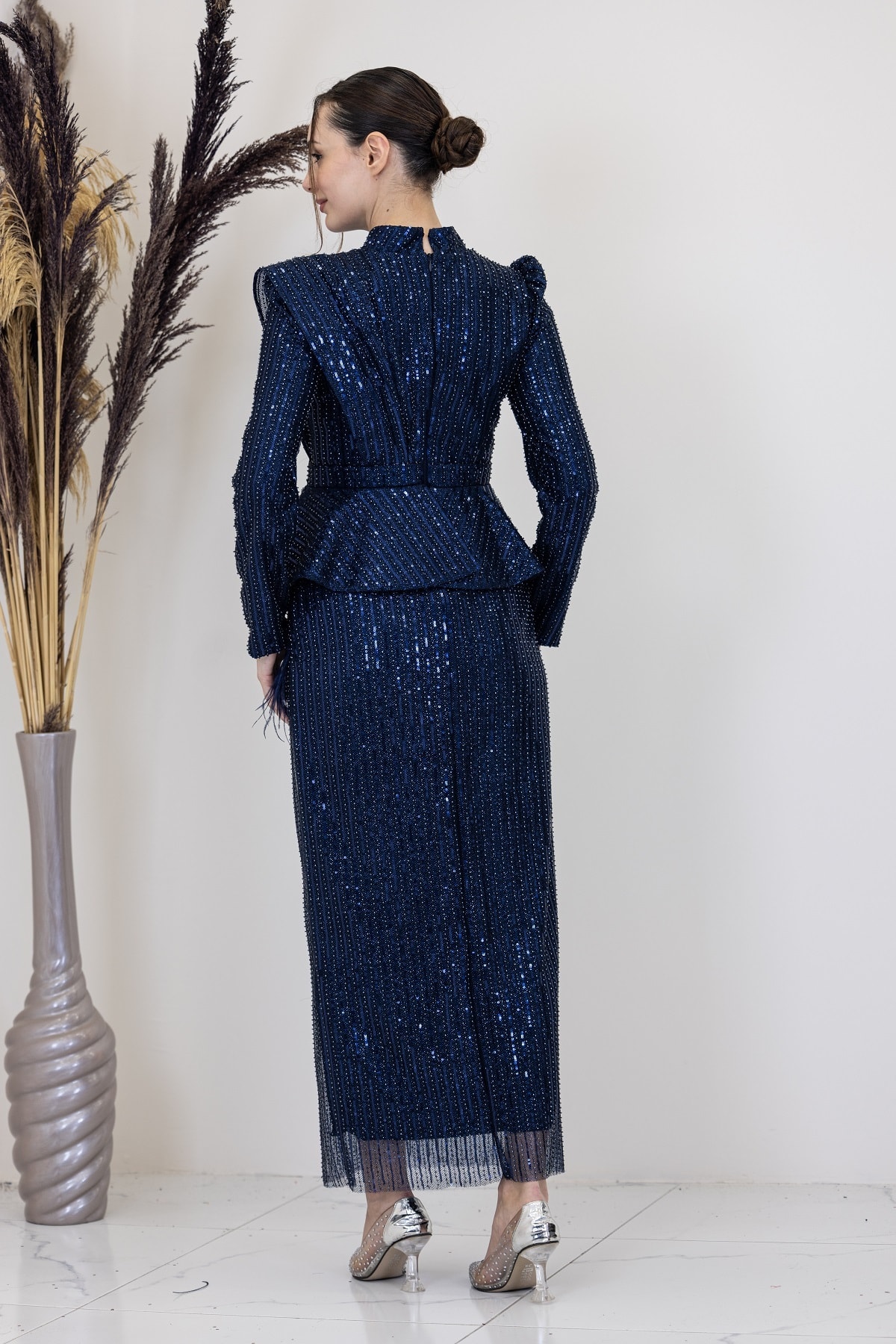 Pamira Evening Dress with Peplum Detail and Ostrich Feather