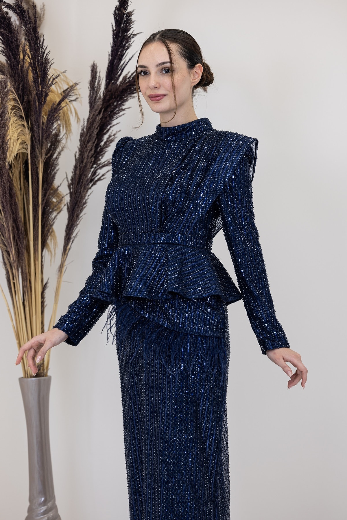 Pamira Evening Dress with Peplum Detail and Ostrich Feather