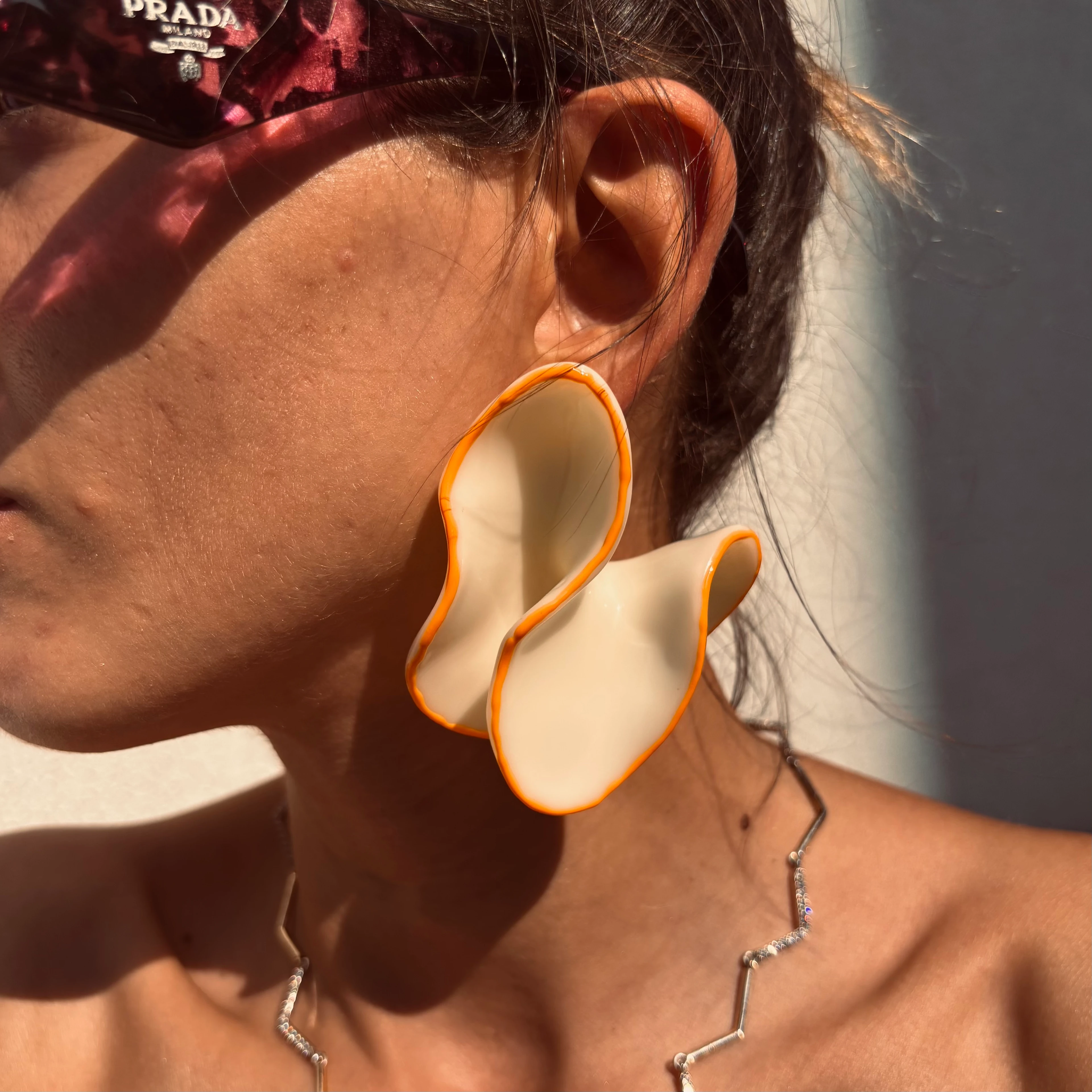 Marka model turuncu/sarı küpe