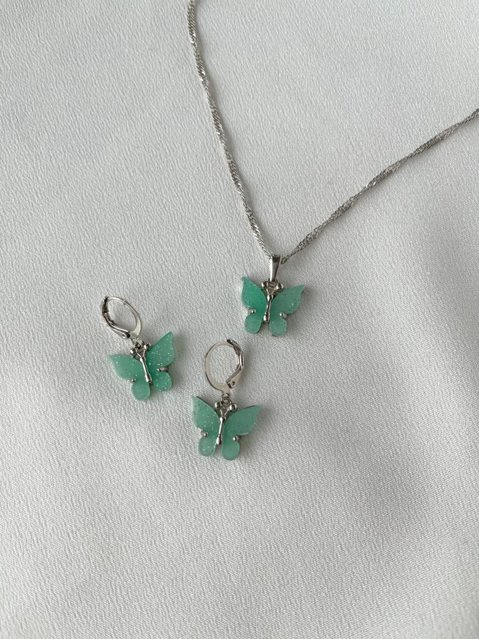 Acrylic butterfly necklace-earring set