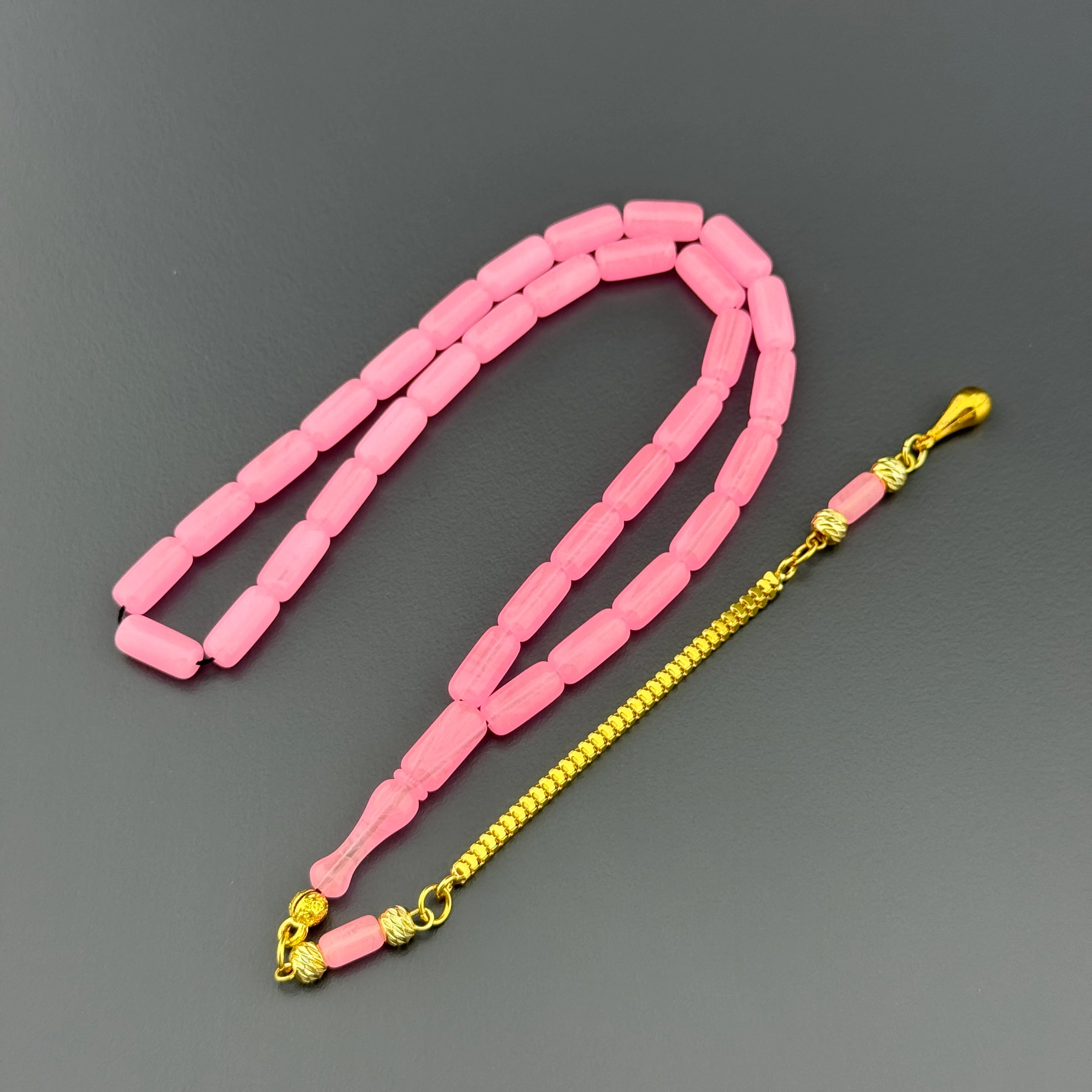 Suat Yeşilyurt Usta İşçilikli Hareli Pembe Kapsül Kesim Gümüş Püsküllü Alman Bakalit Tesbih