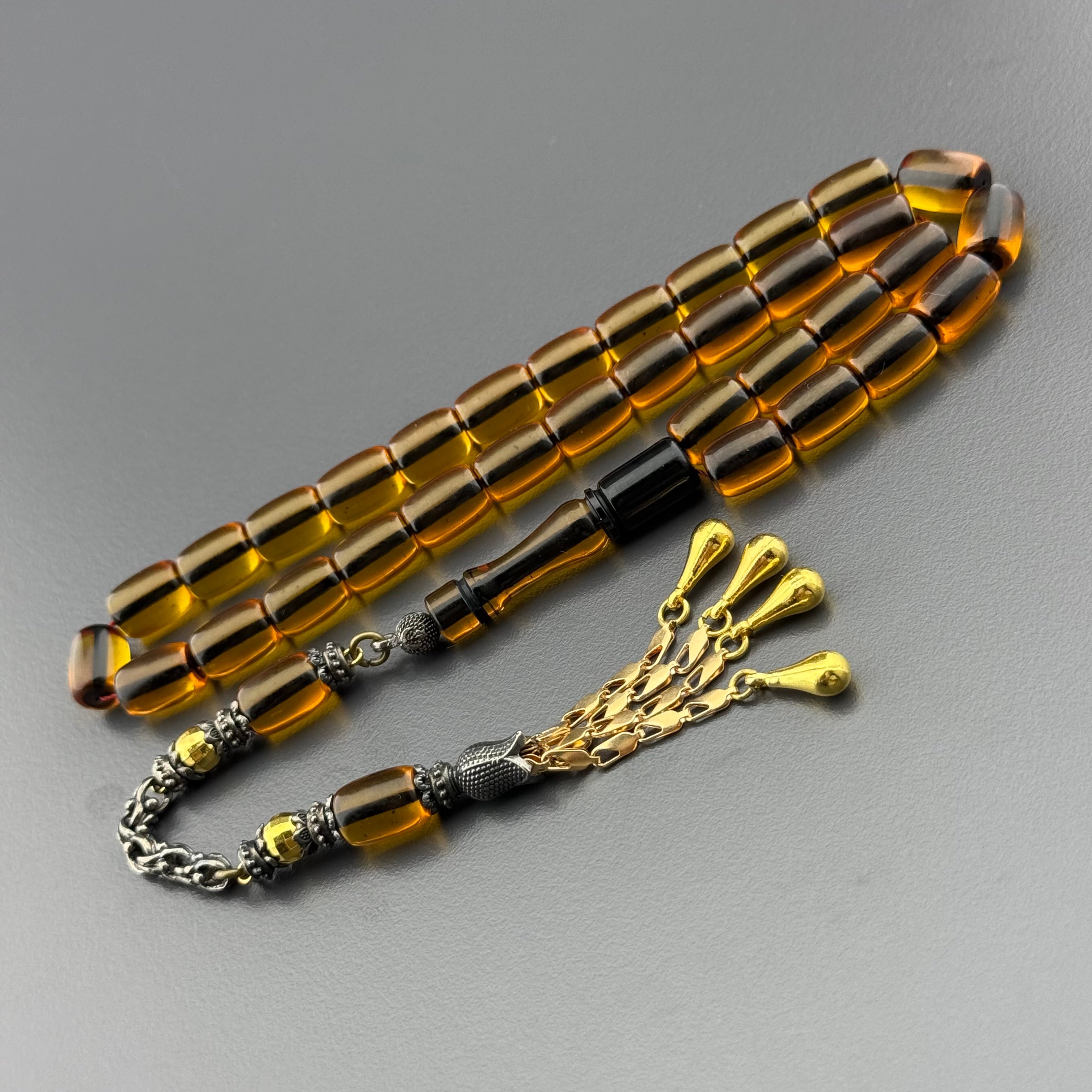 Özel Usta İşçilikli Amber Kapsül Model Gold Detaylı Alpaka Püsküllü Ateş Kehribar Tespih