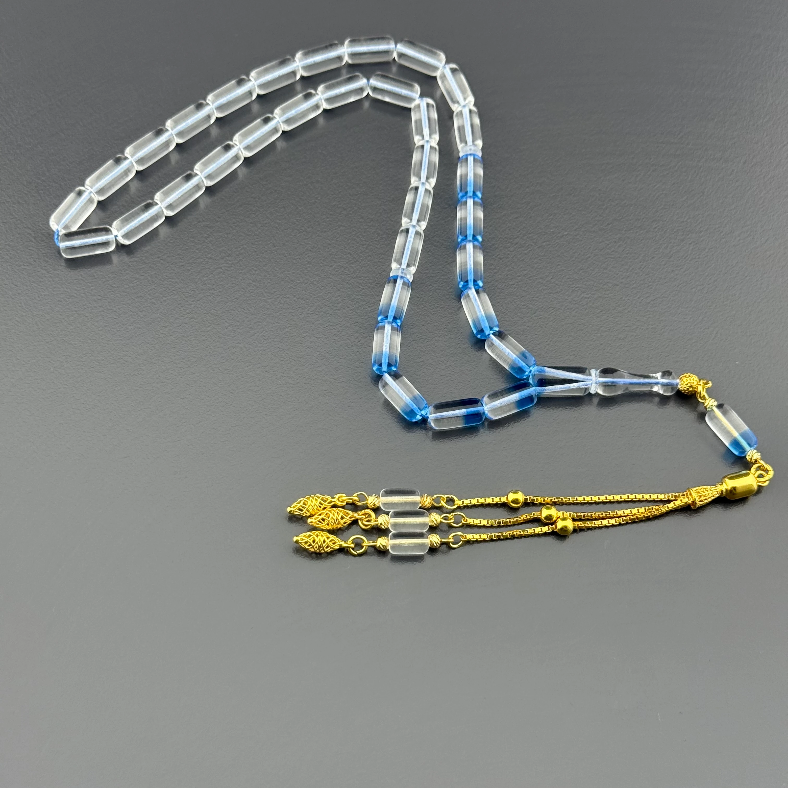 Suat YEŞİLYURT Usta İşçilikli Mavi Şeffaf Kapsül Kesim Altın Kaplama Gümüş Püsküllü Alman Bakalit Tesbih