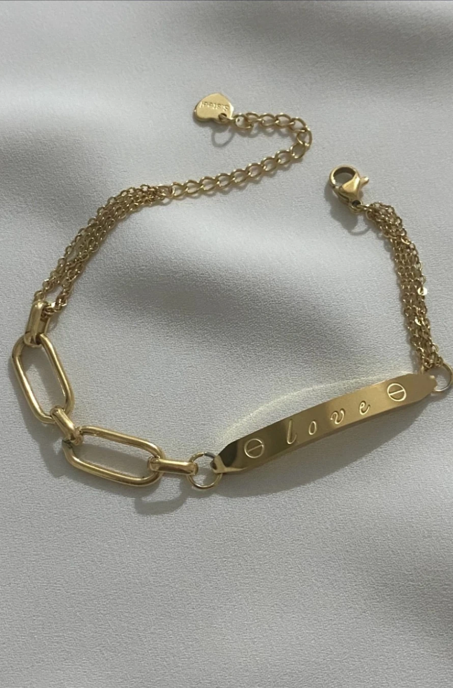 LOVE YAZILI KÜNYE KARARMAZ ÇELİK ALTIN RENKLİ BİLEKLİK