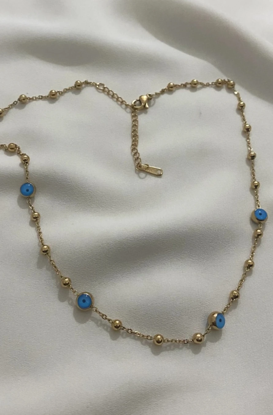 Nazar BoncuklıKararmaz Çelik Altın Renkli Kolye