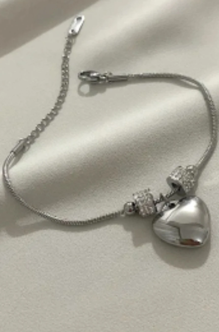 KALPLİ PNDORA MODEL KARARMAZ ÇELİK GÜMÜŞ RENKLİ BİLEKLİK