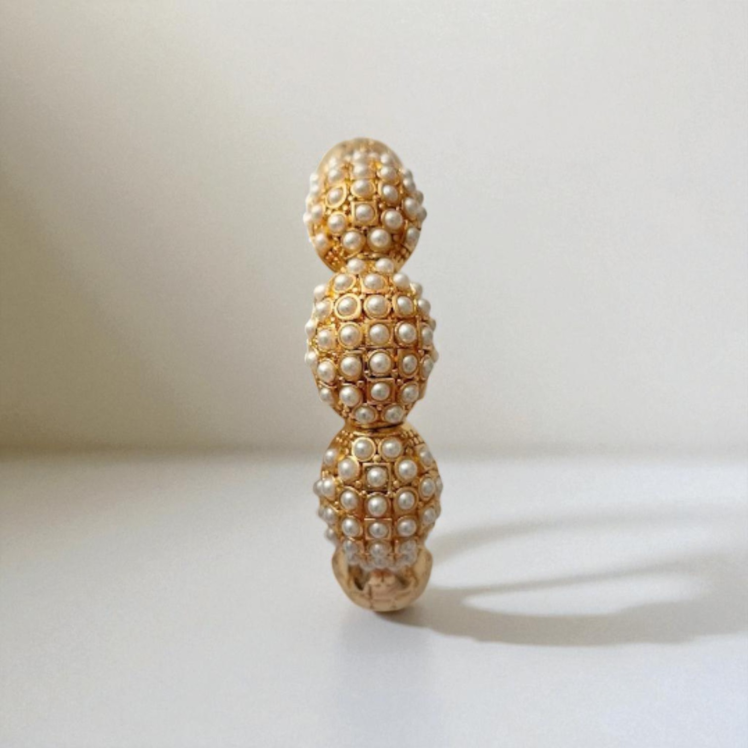 Dome Bracelet with Geometric Patterns and Pearl Details