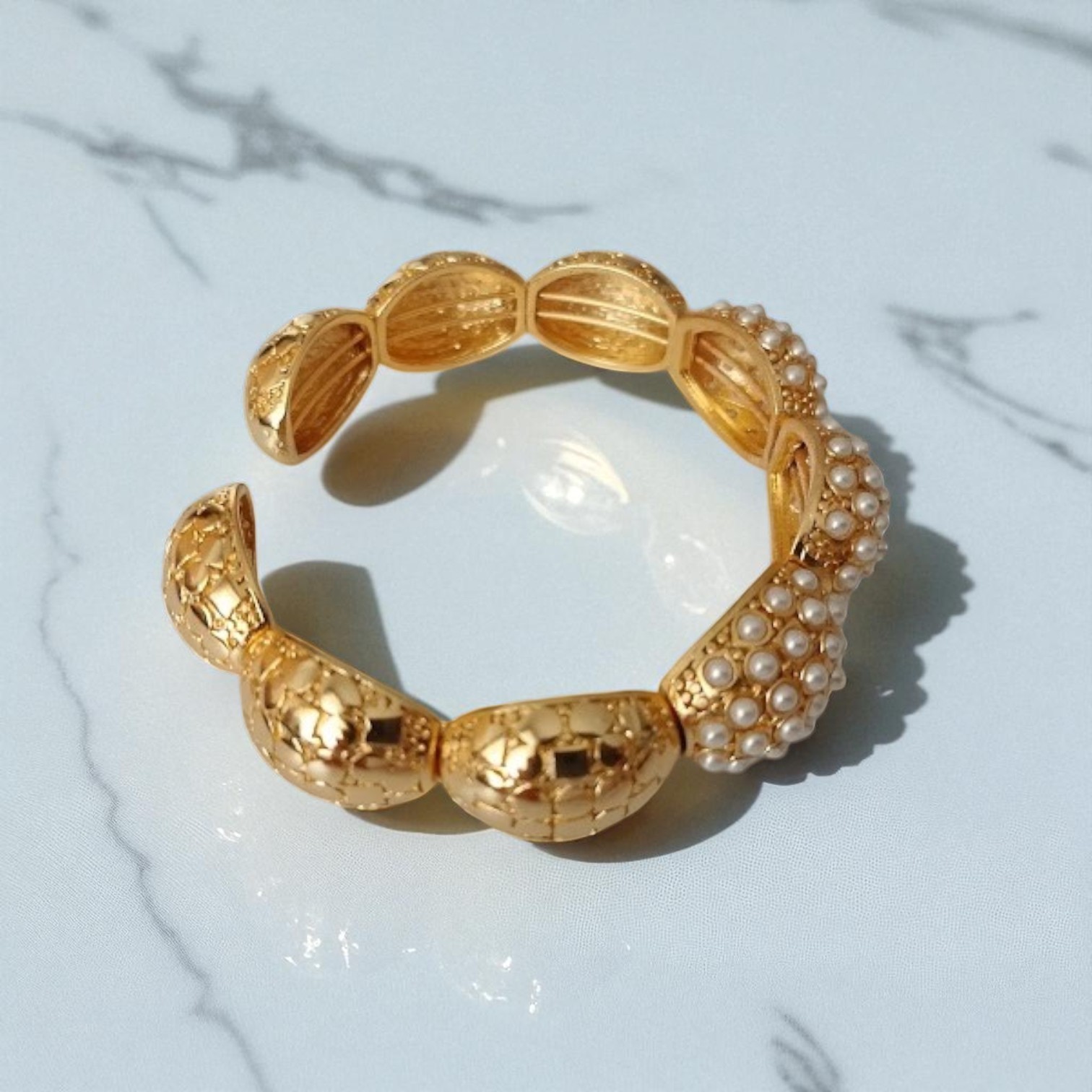 Dome Bracelet with Geometric Patterns and Pearl Details