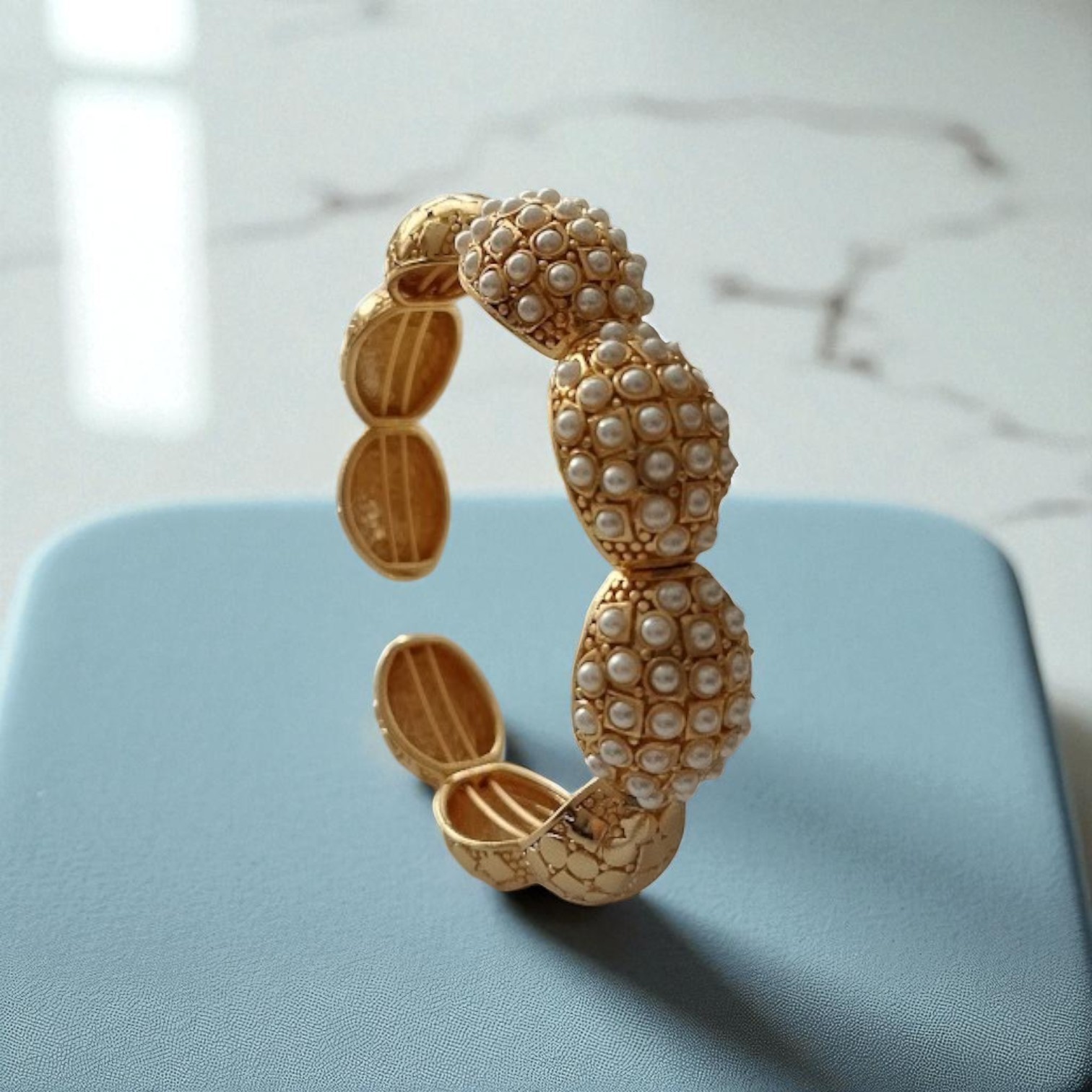 Dome Bracelet with Geometric Patterns and Pearl Details