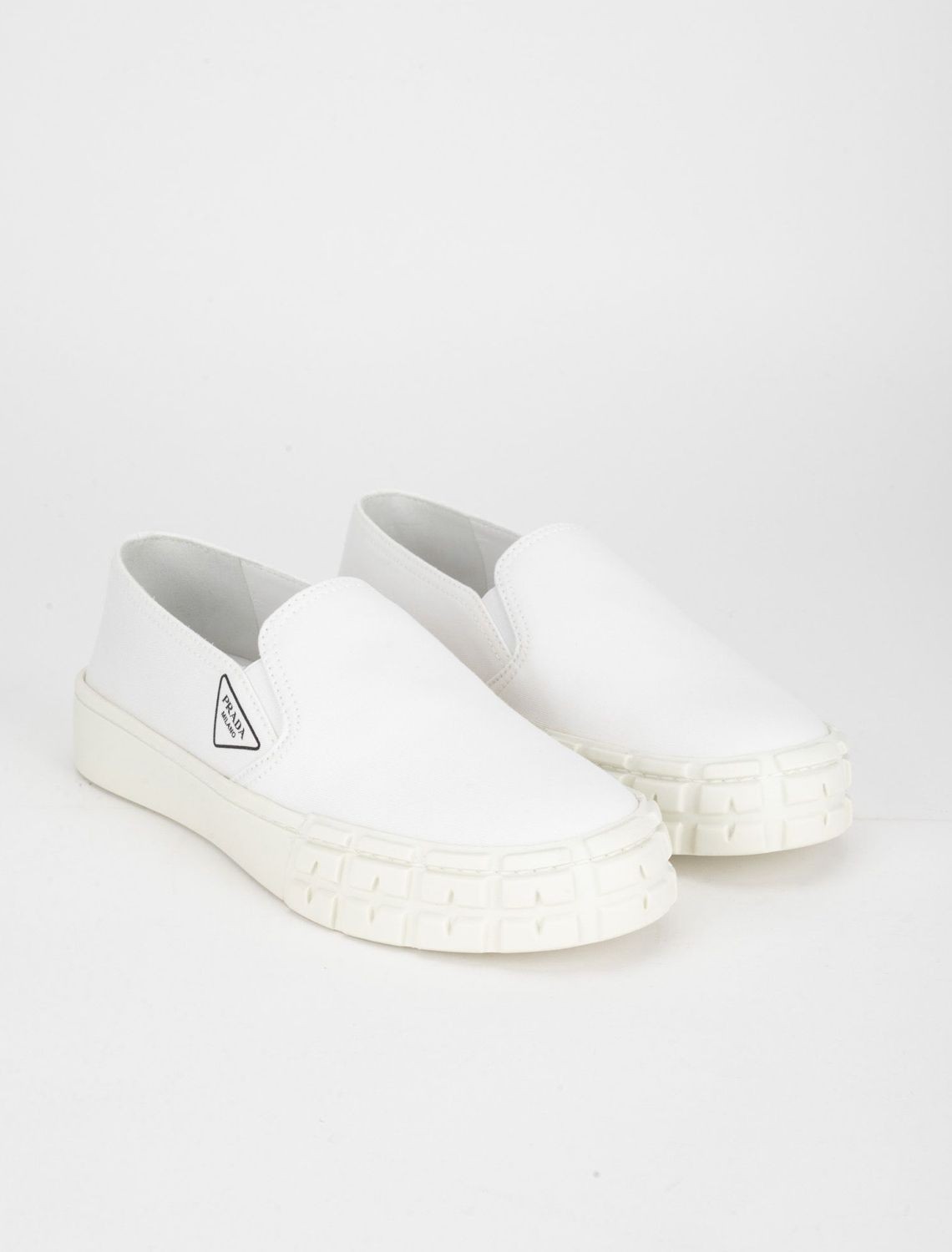 White Slip On Sneakers