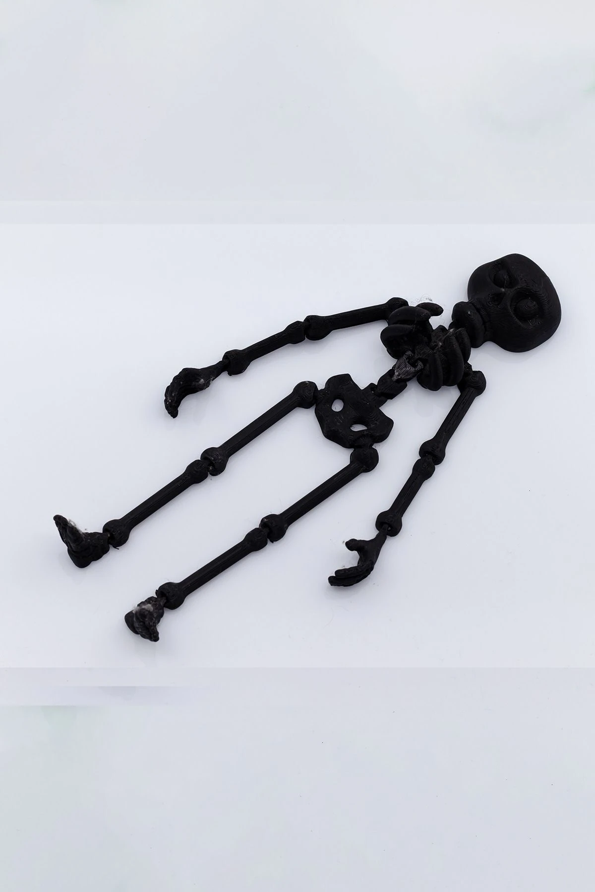 Siyah İnsan İskelet Figürlü Hareketli Oyuncak