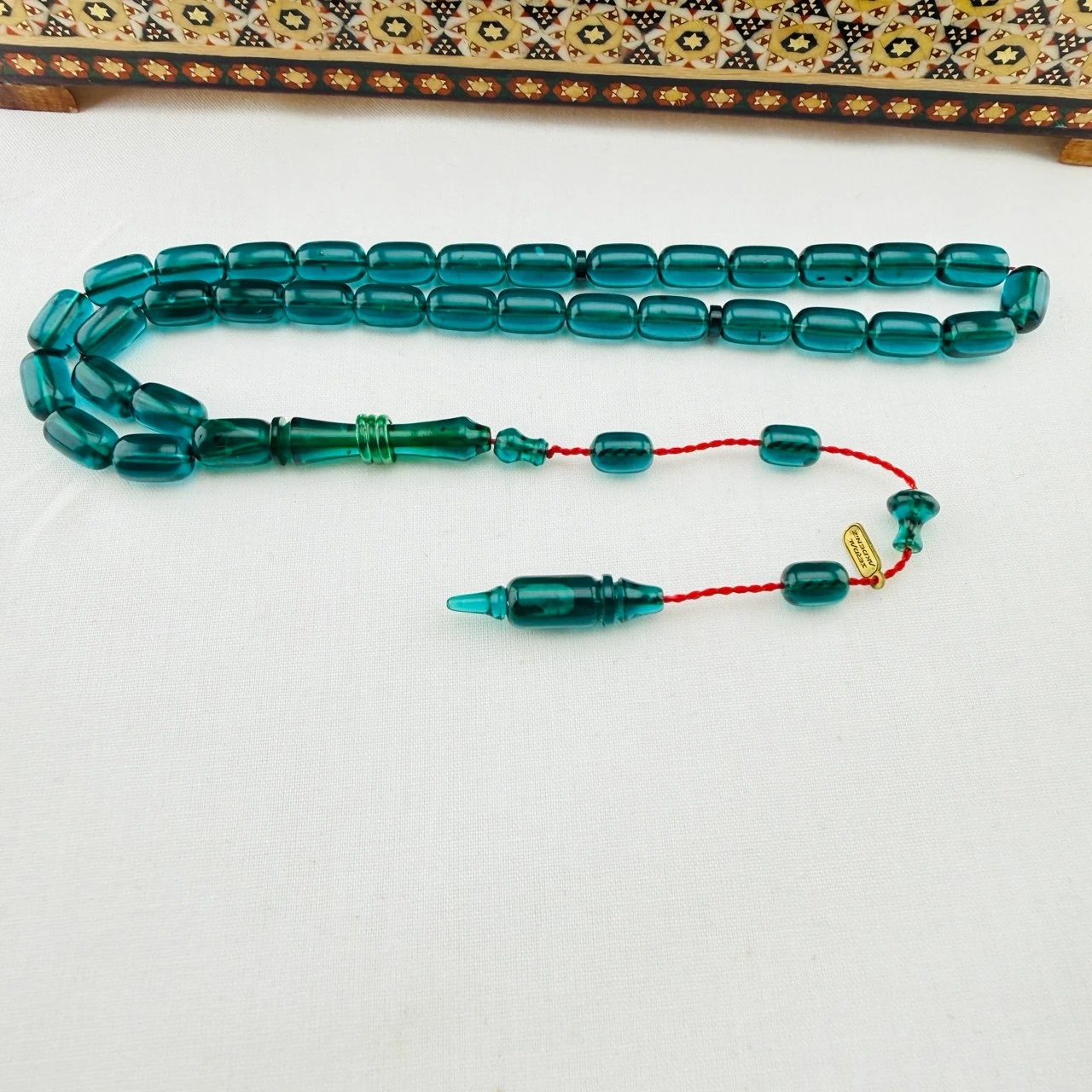 Serdar Akdeniz Usta İmzalı Petrol Yeşili Şeffaf Blok Zar Sıkma Kehribar Tespih