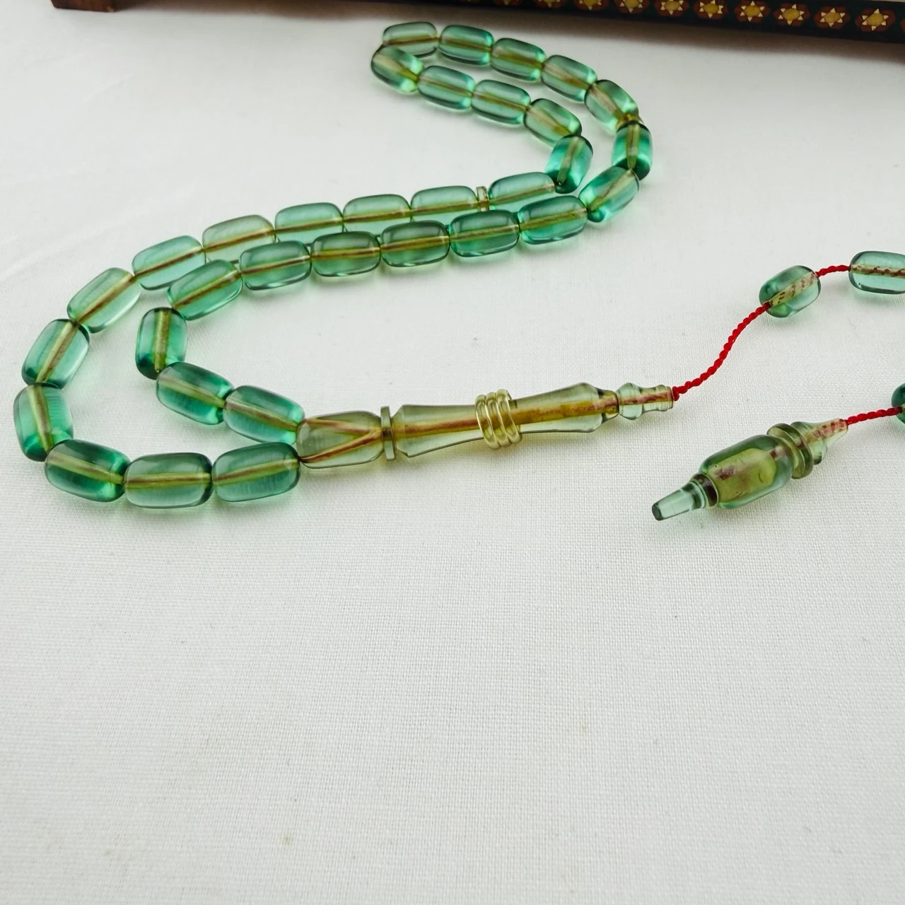 Serdar Akdeniz Usta İmzalı Su Yeşili Şeffaf Blok Zar Sıkma Kehribar Tespih