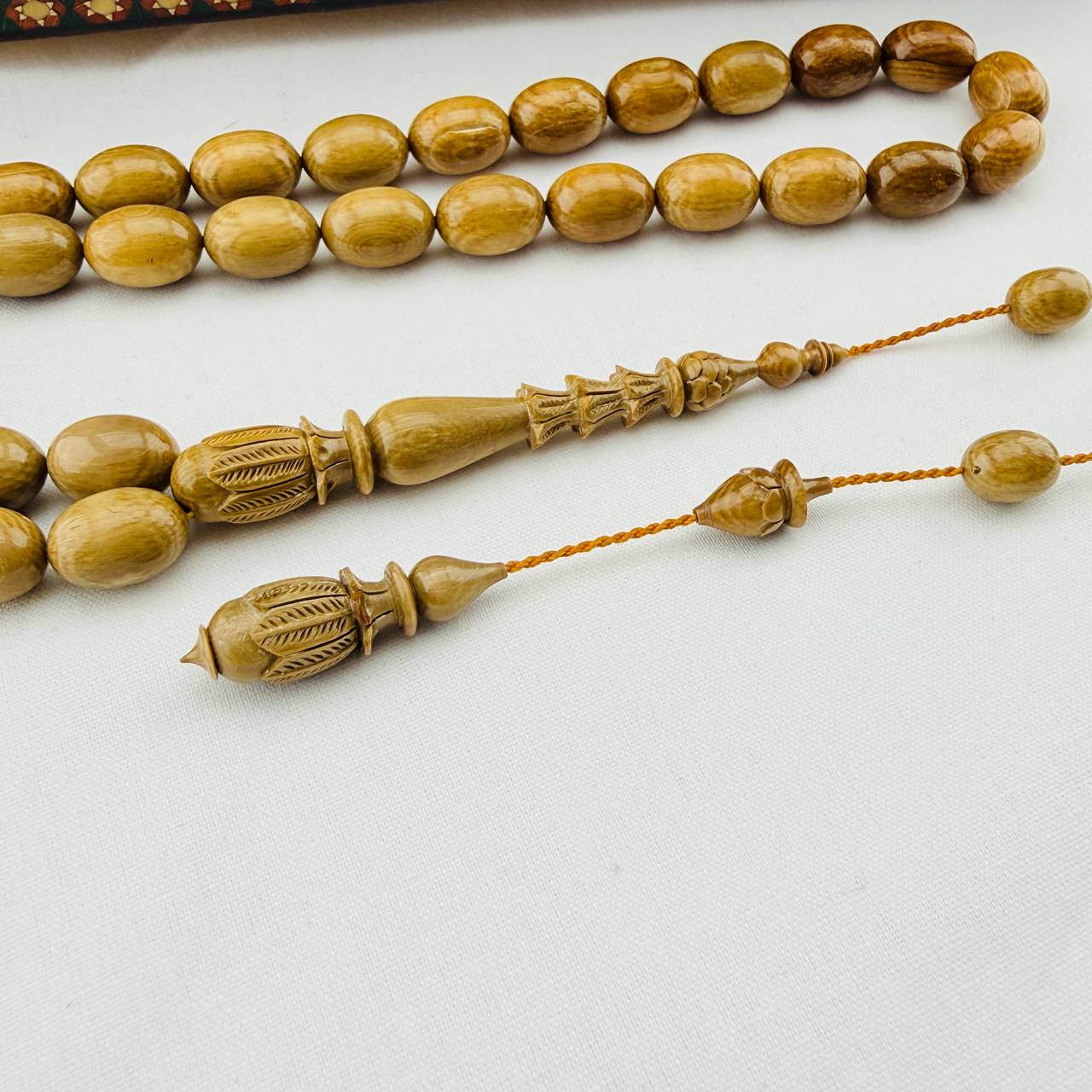 Barış Bülbül Usta Yapımı Kahverengi Mamut Dişi Tespih – Doğanın Gücünü Sanatla Buluşturan Eser