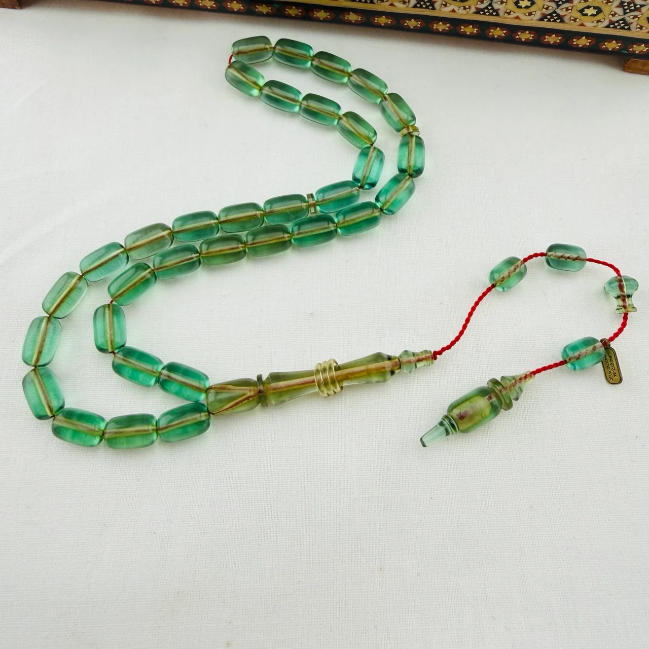 Serdar Akdeniz Usta İmzalı Su Yeşili Şeffaf Blok Zar Sıkma Kehribar Tespih