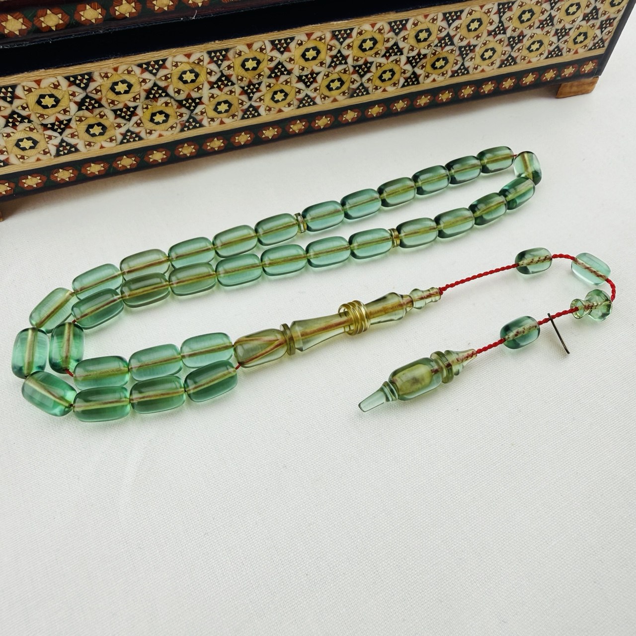 Serdar Akdeniz Usta İmzalı Su Yeşili Şeffaf Blok Zar Sıkma Kehribar Tespih