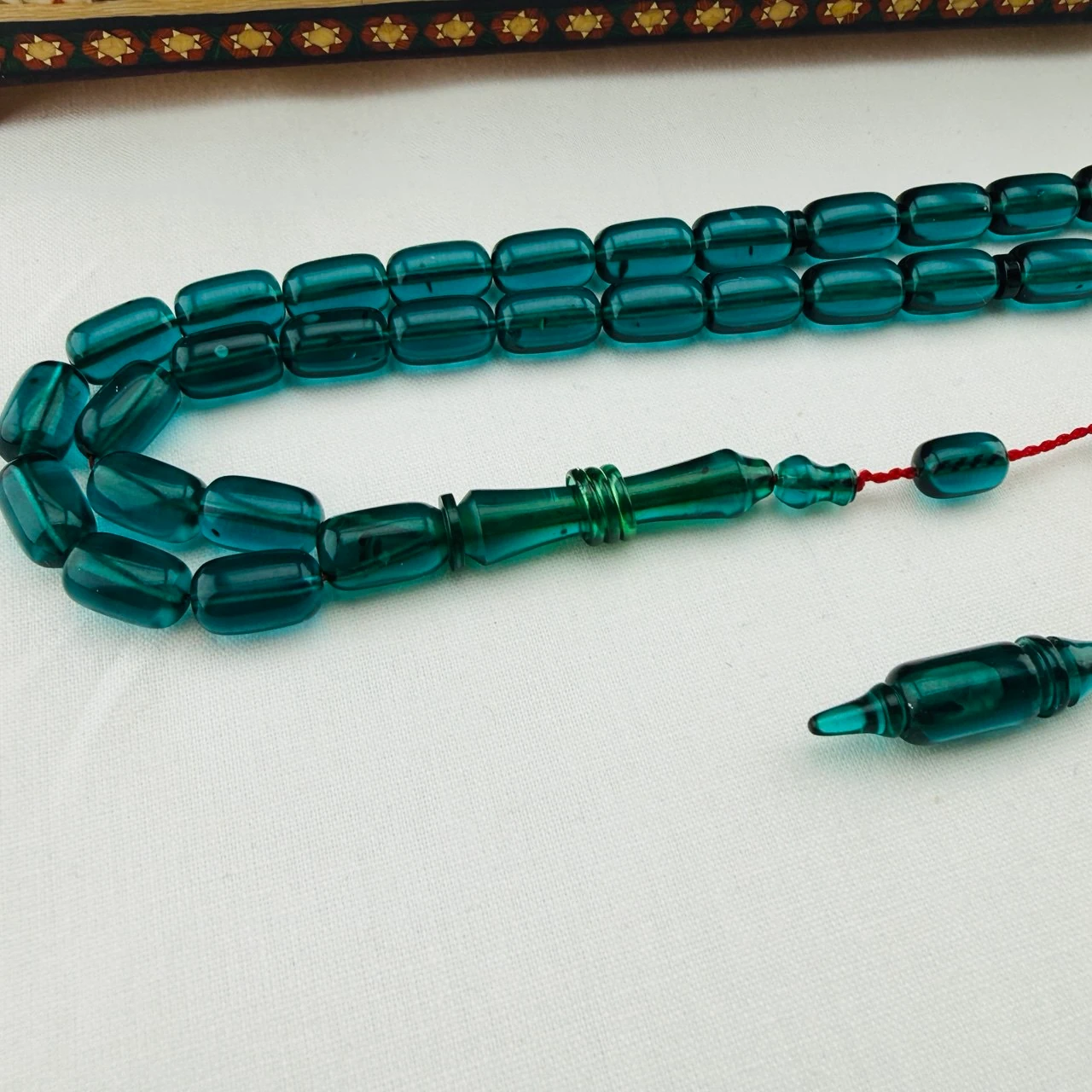 Serdar Akdeniz Usta İmzalı Petrol Yeşili Şeffaf Blok Zar Sıkma Kehribar Tespih