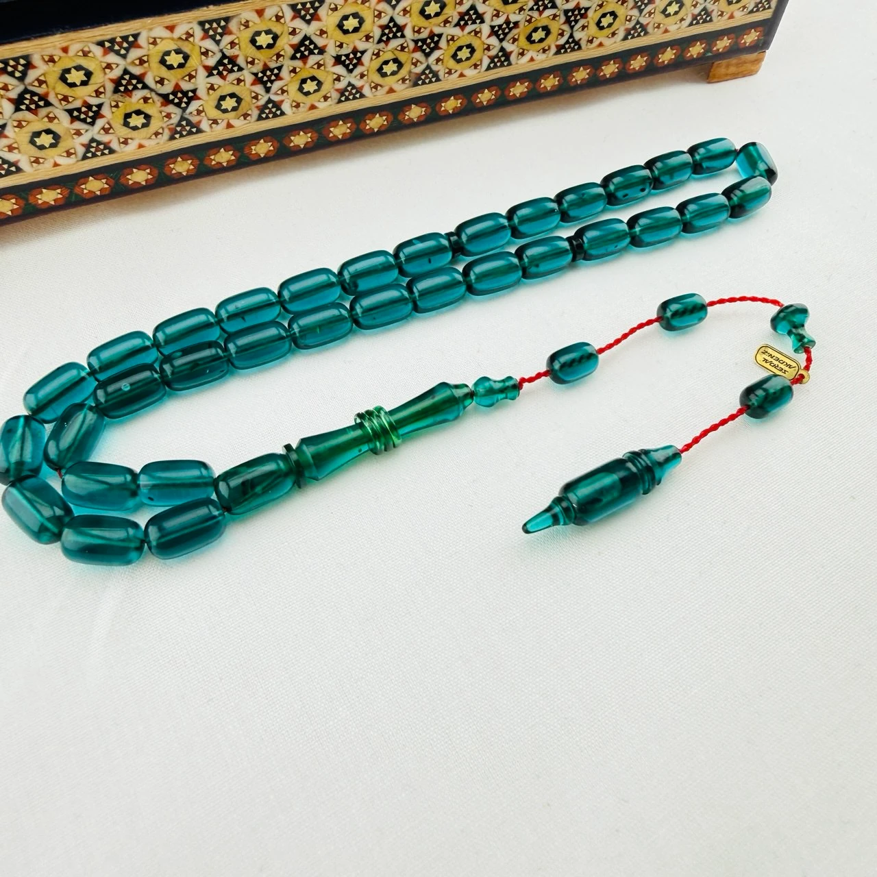 Serdar Akdeniz Usta İmzalı Petrol Yeşili Şeffaf Blok Zar Sıkma Kehribar Tespih