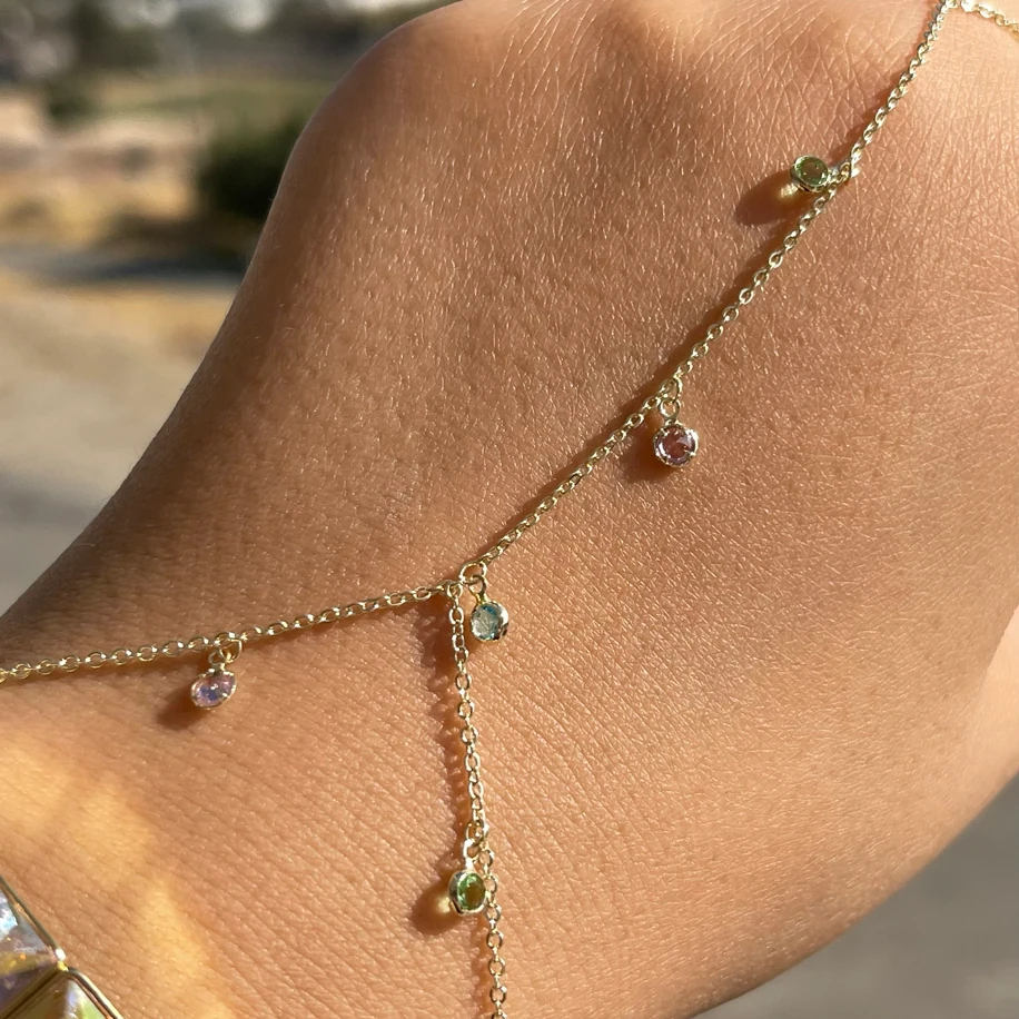 ZİRKON SALLANTILI RENKLİ TAŞ DETAY ŞAHMERAN