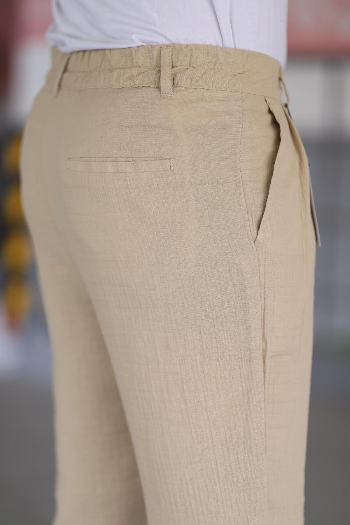 Çift Pileli Beli Lastikli Kaliteli Rahat Kesim Müslin Baggy Pantolon