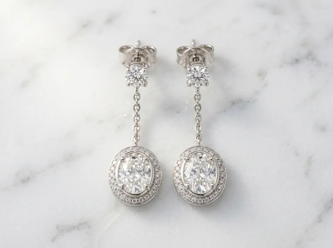 Oval Halo Pavé Pırlanta Sallantılı Küpe