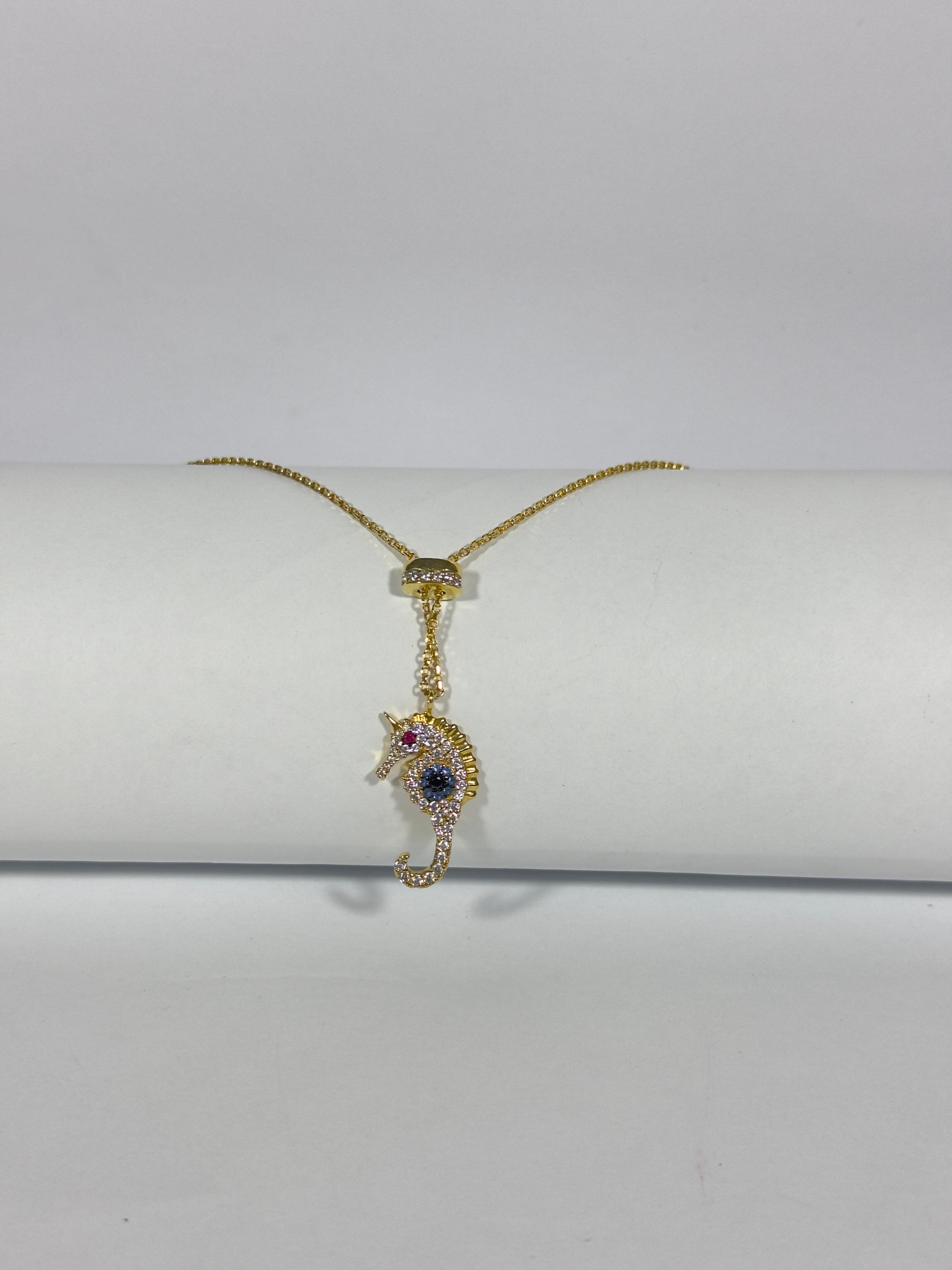 Nebula. Gold Shiny Seahorse