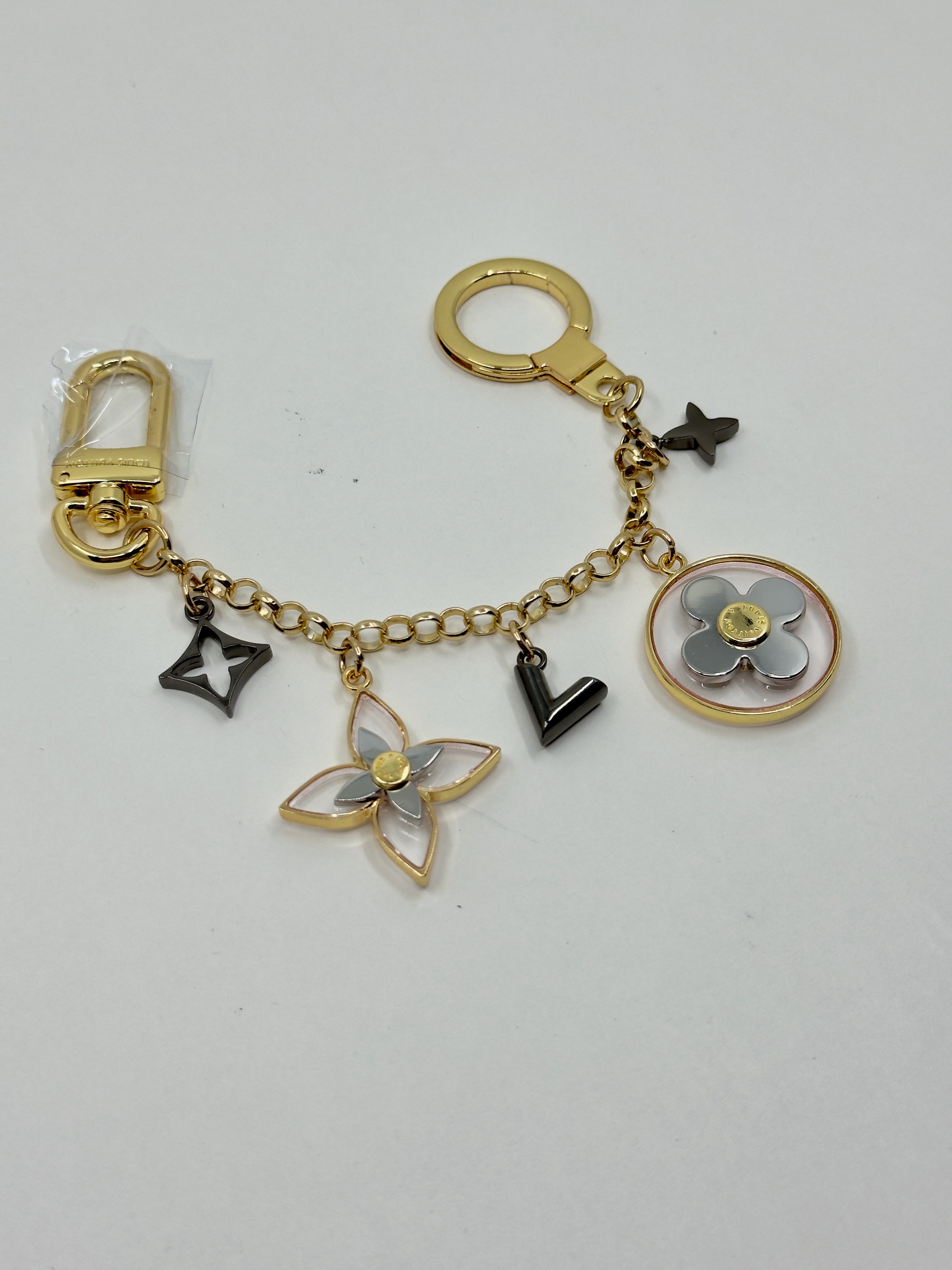 LV. Gold Logo Bag Charm
