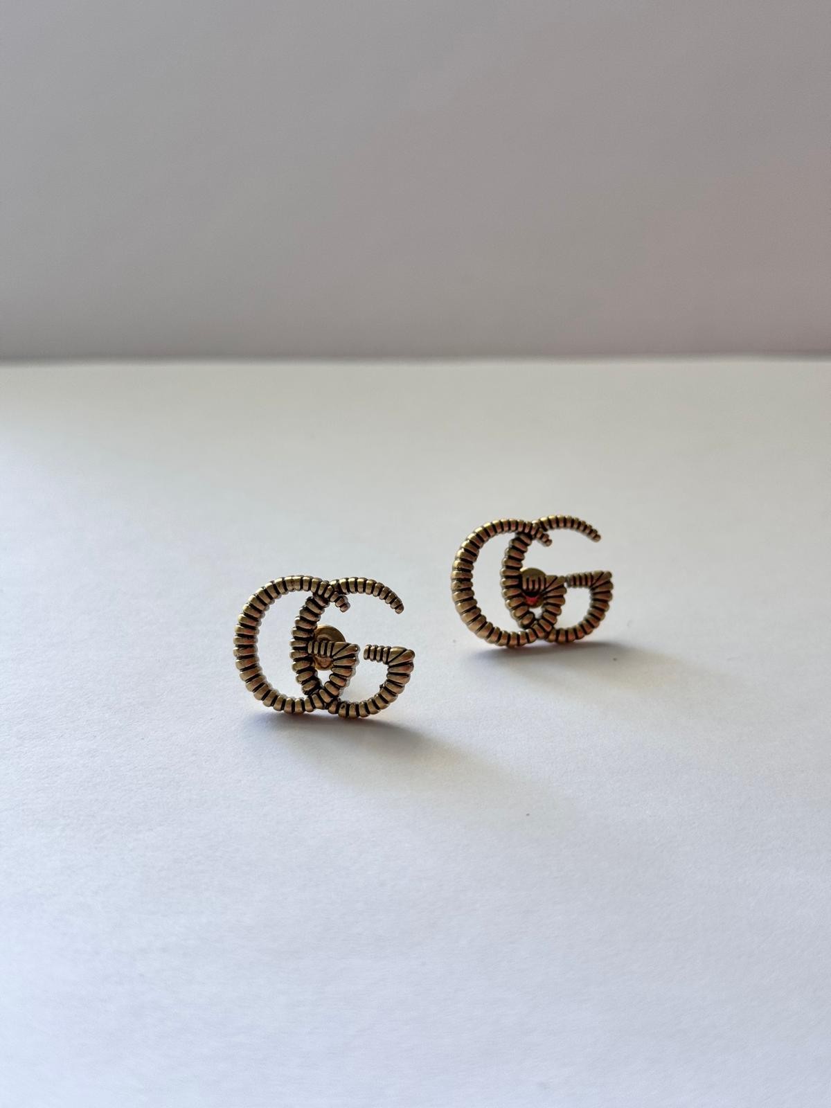 Gcci. GG Gold Çivi Küpe