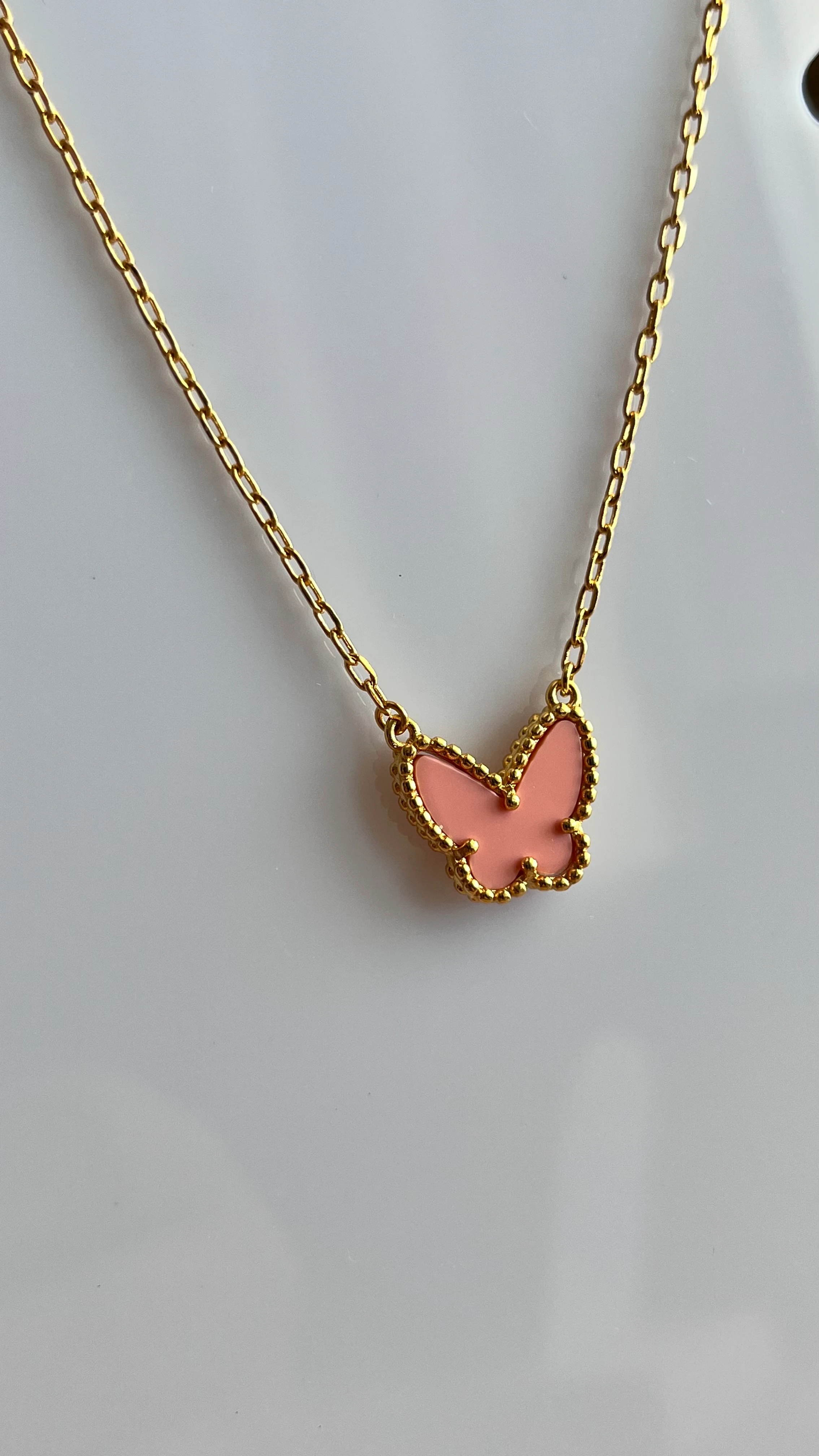 vca pembe kelebek kolye