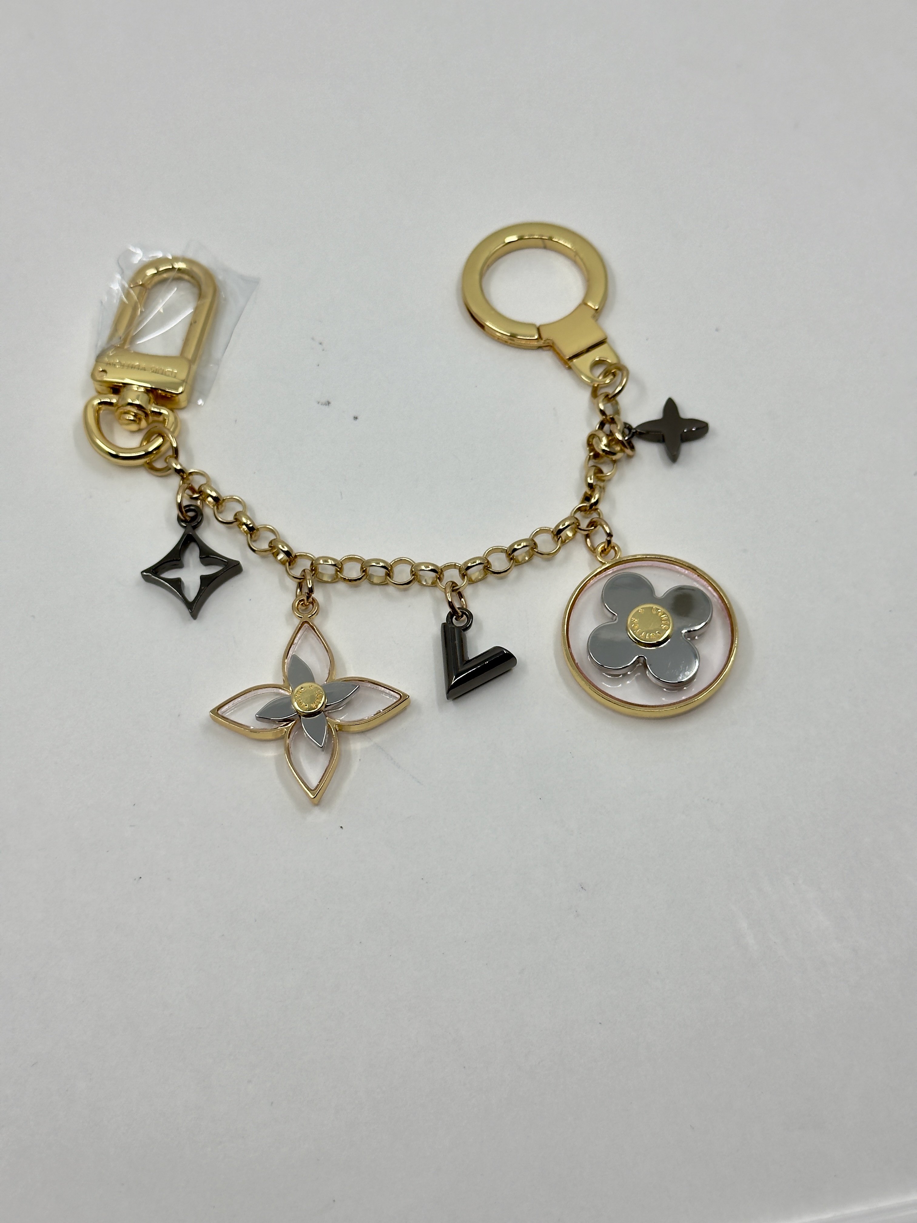 LV. Gold Logo Bag Charm