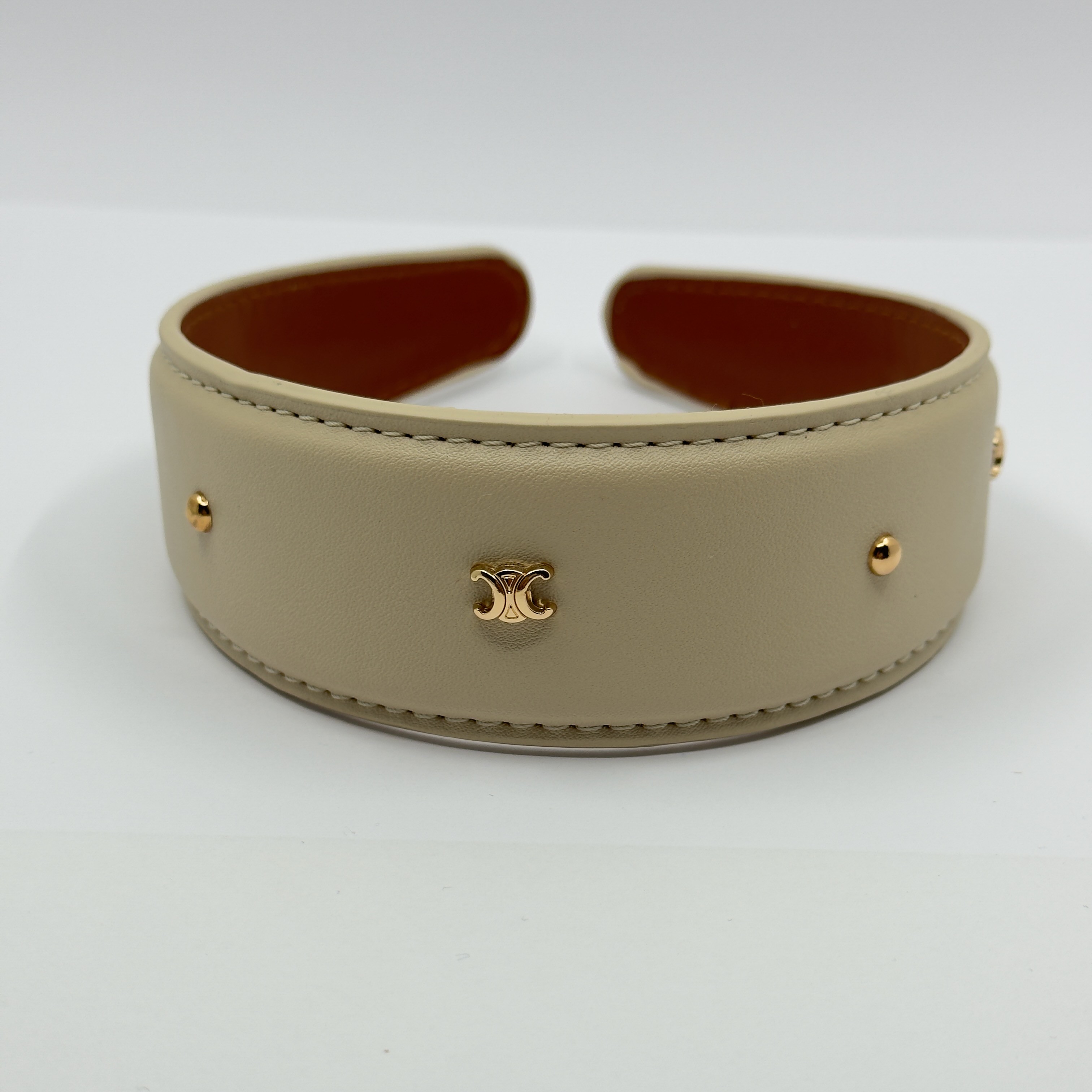 Clne. Krem Gold Logo Taç
