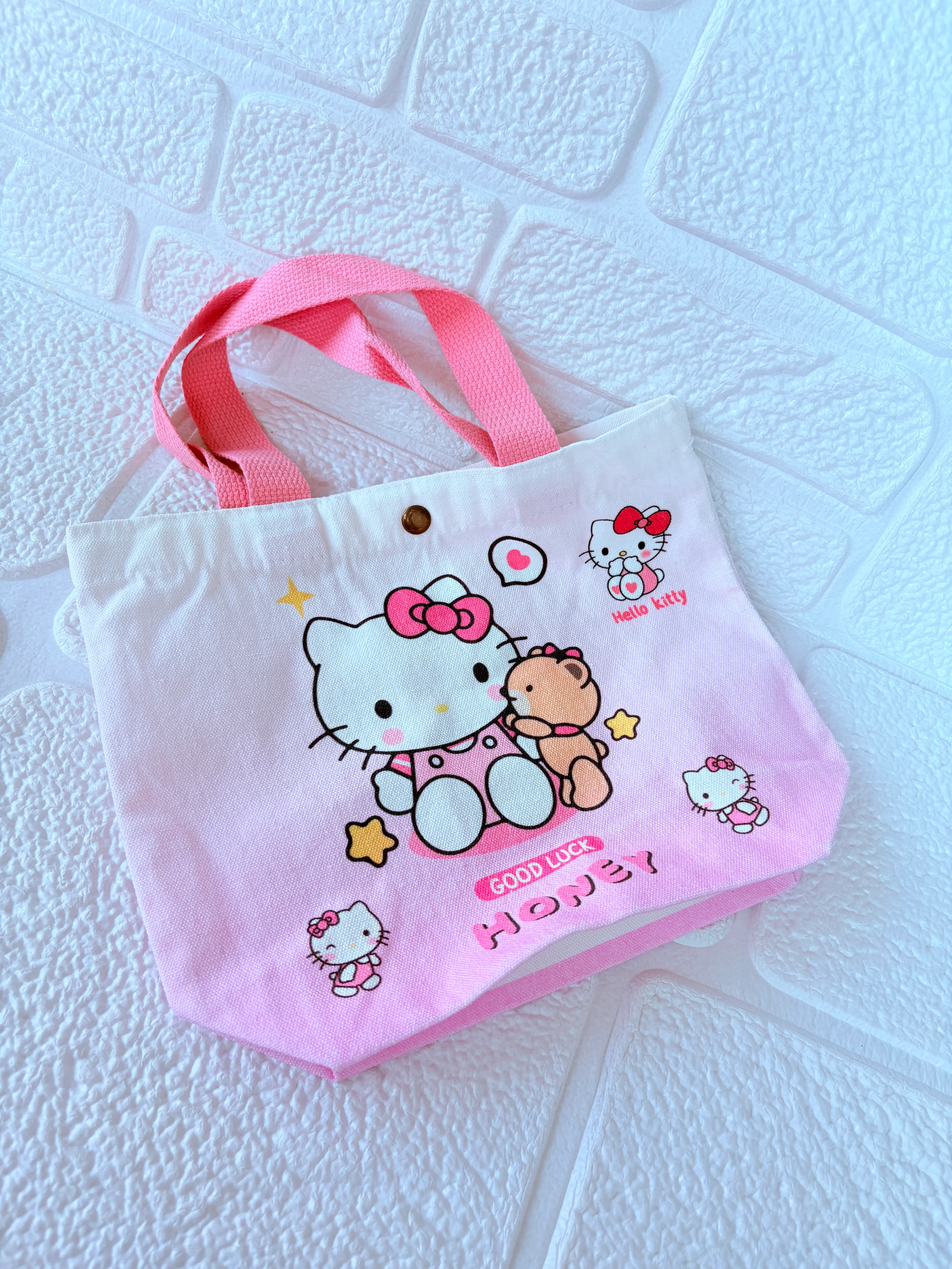 Hello Kitty Pembe Kanvas Çanta – Sevimli Desenli Kumaş Çanta