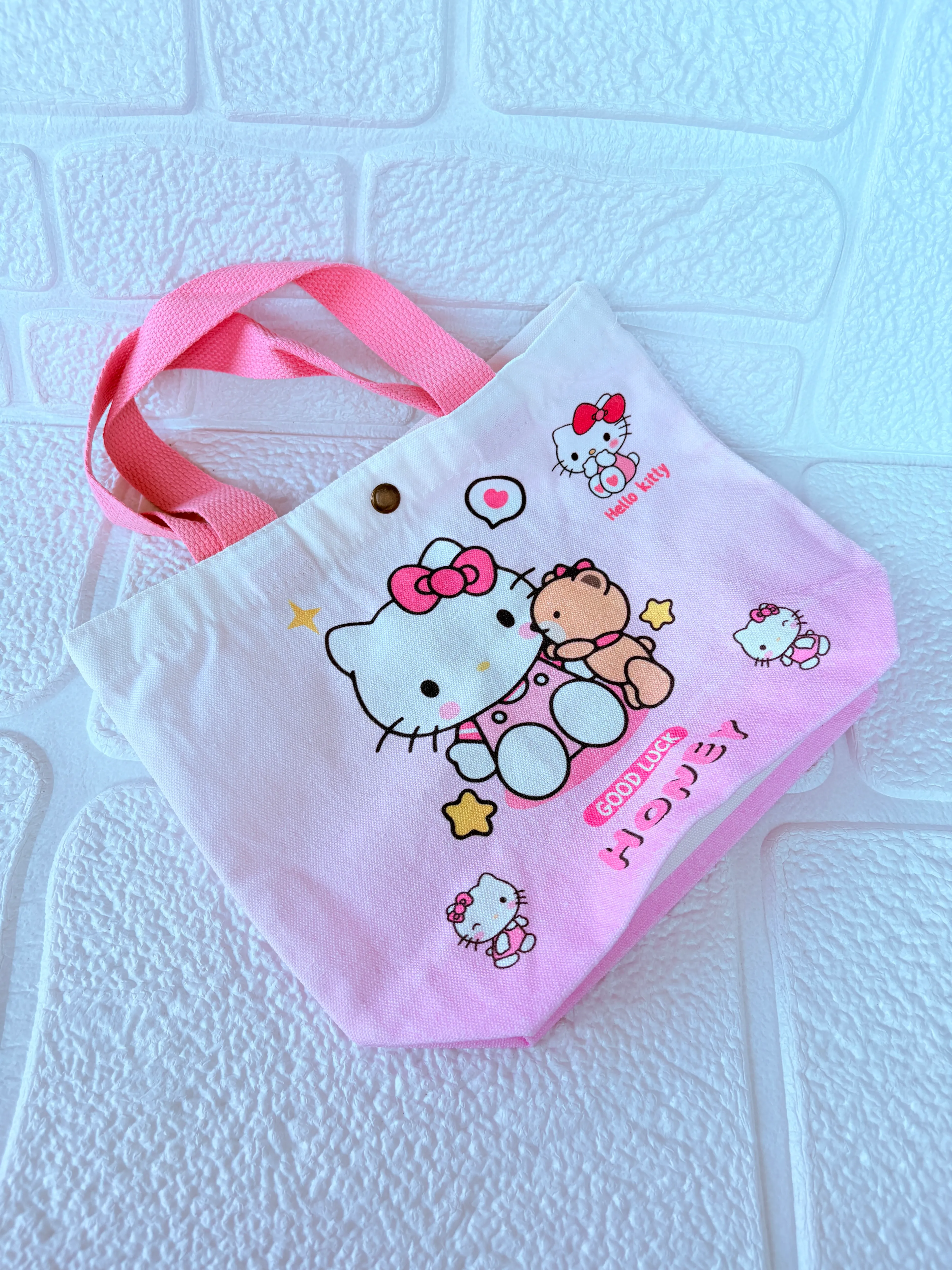 Hello Kitty Pembe Kanvas Çanta – Sevimli Desenli Kumaş Çanta