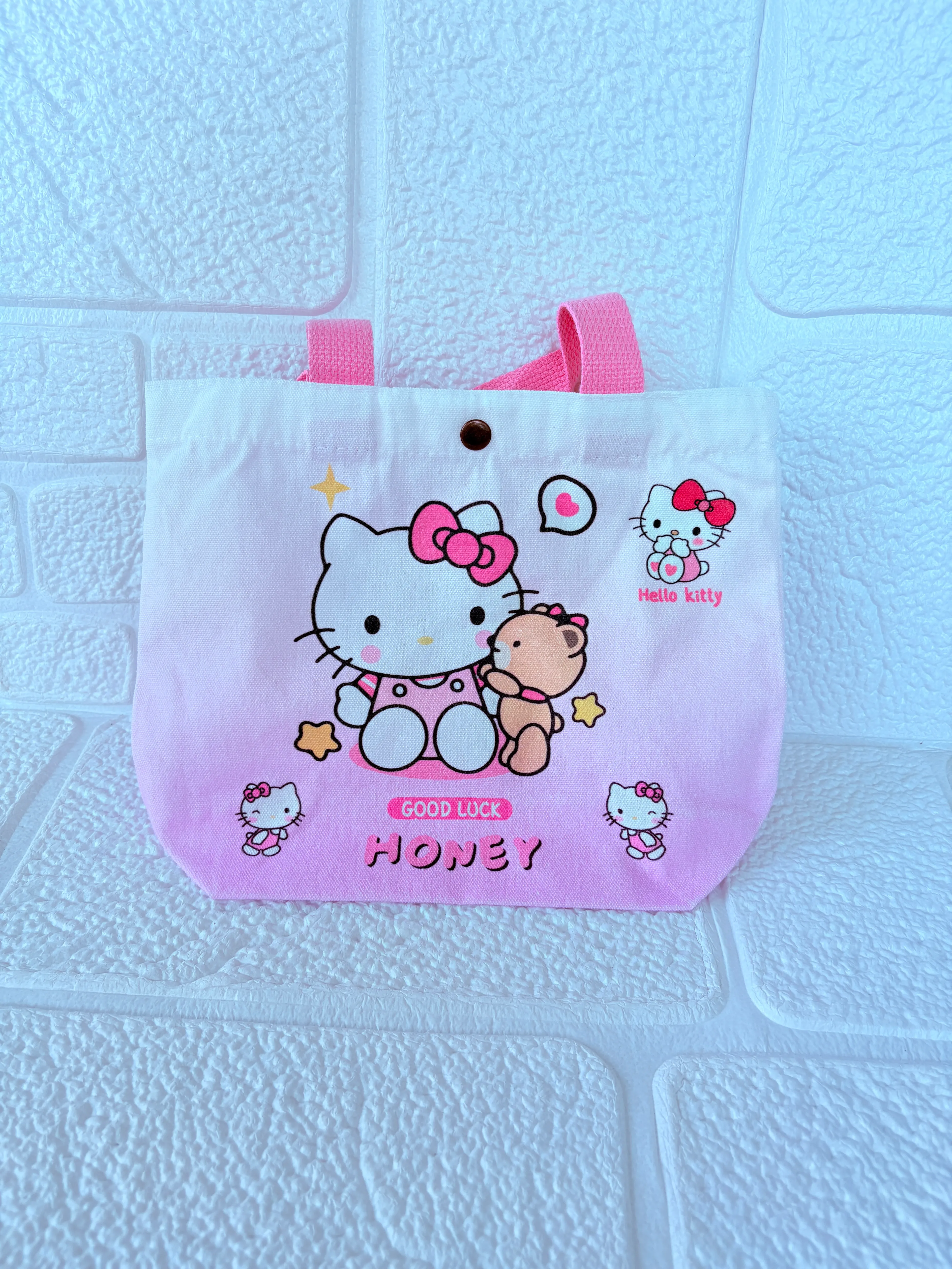 Hello Kitty Pembe Kanvas Çanta – Sevimli Desenli Kumaş Çanta
