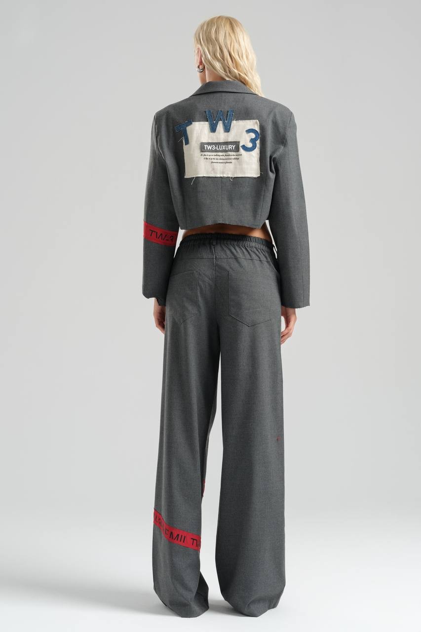 Wide Leg Trousers with Emblem Detail