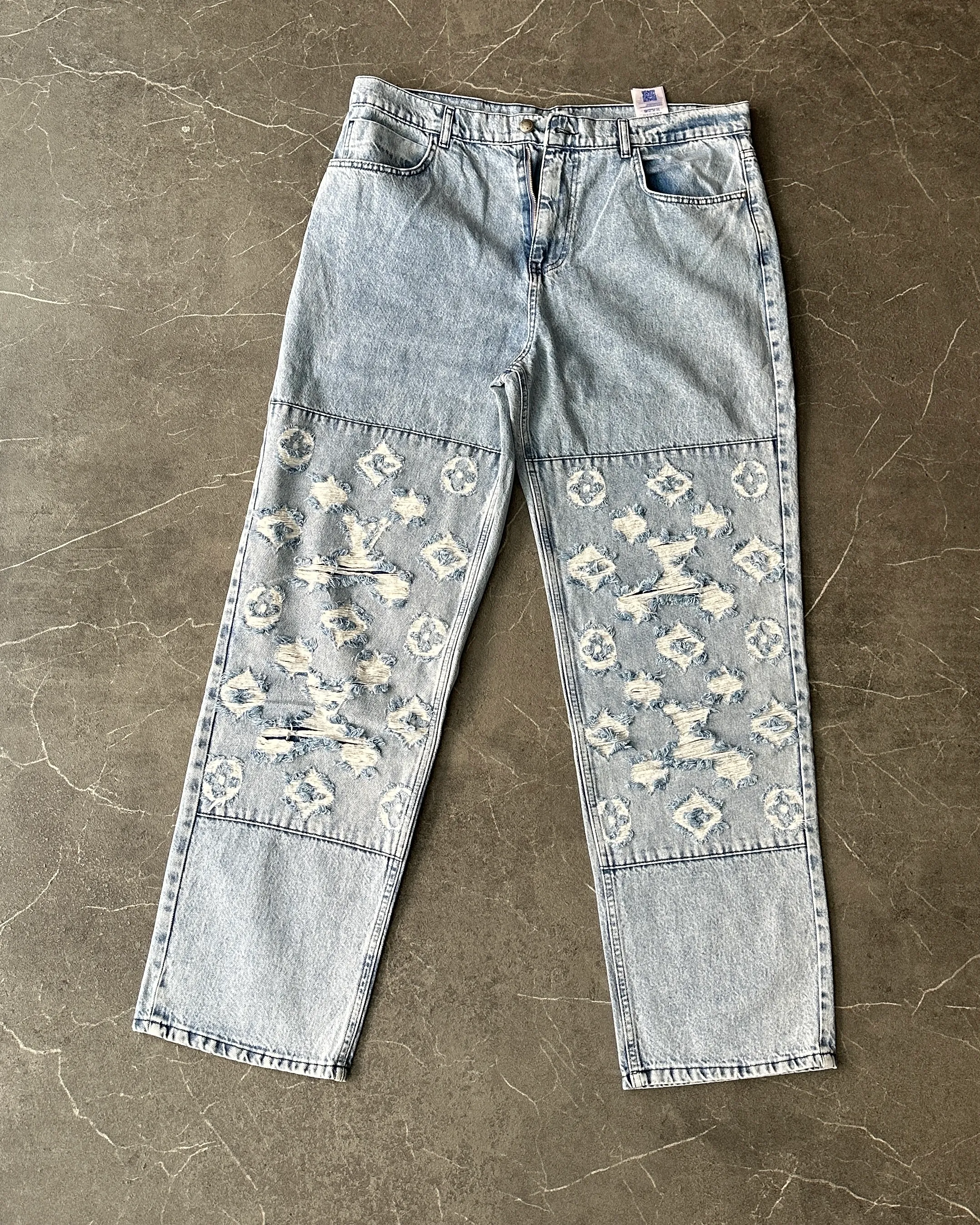 Yırtmaçlı Logo Detaylı Kot Pantolon