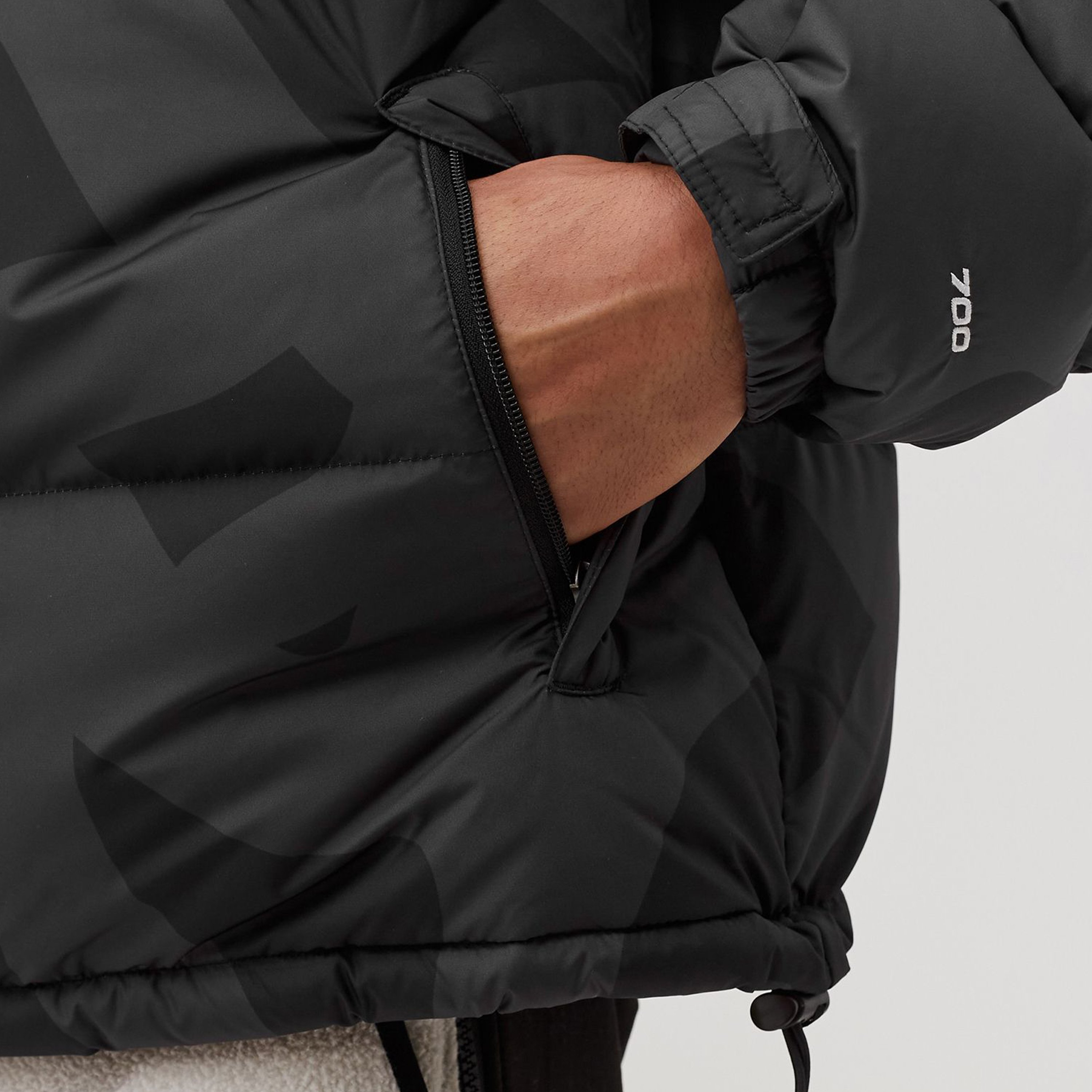 KAWS x TNF Mont