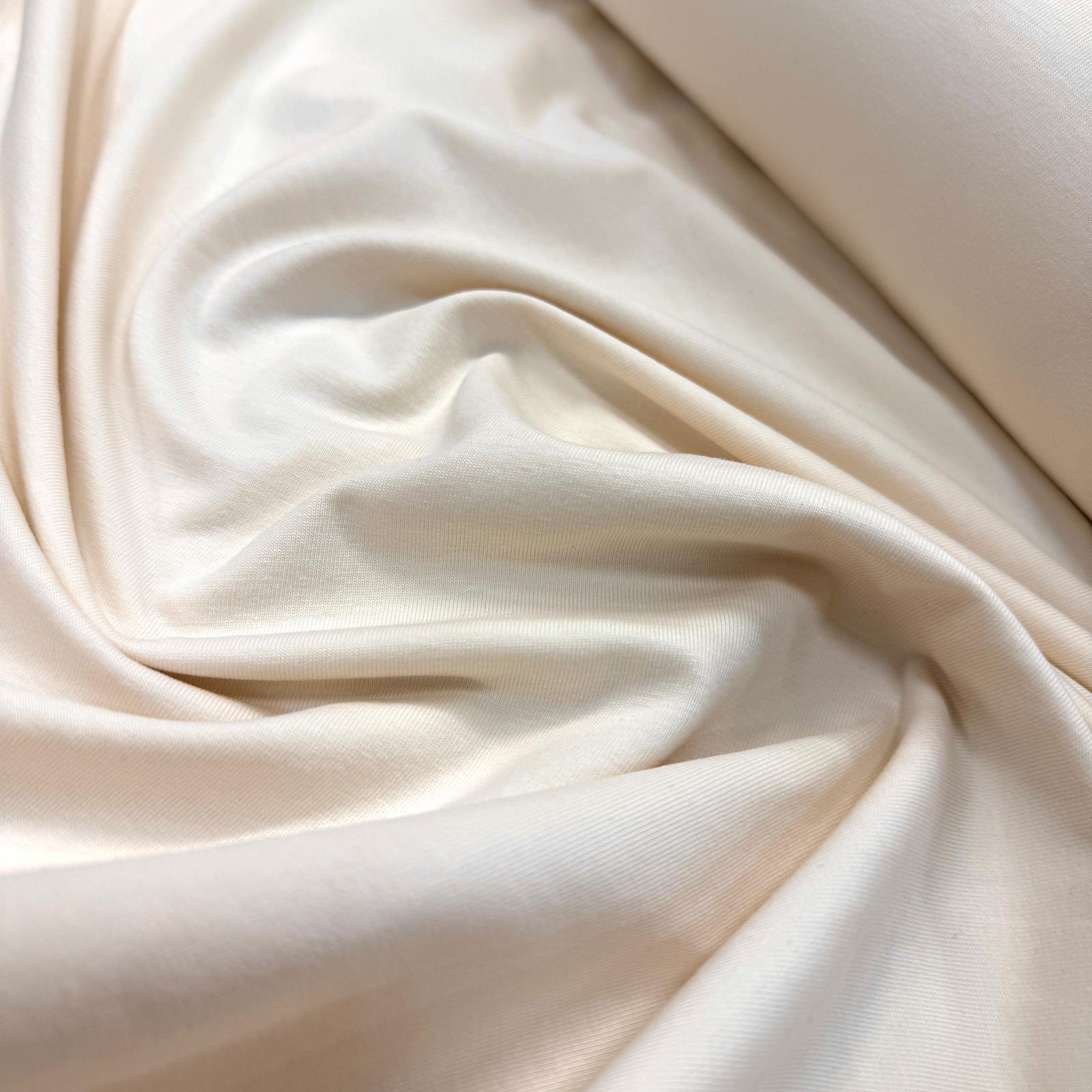 Ekru İntaşlar Markalı 30/1 Likralı Süprem Penye Kumaş