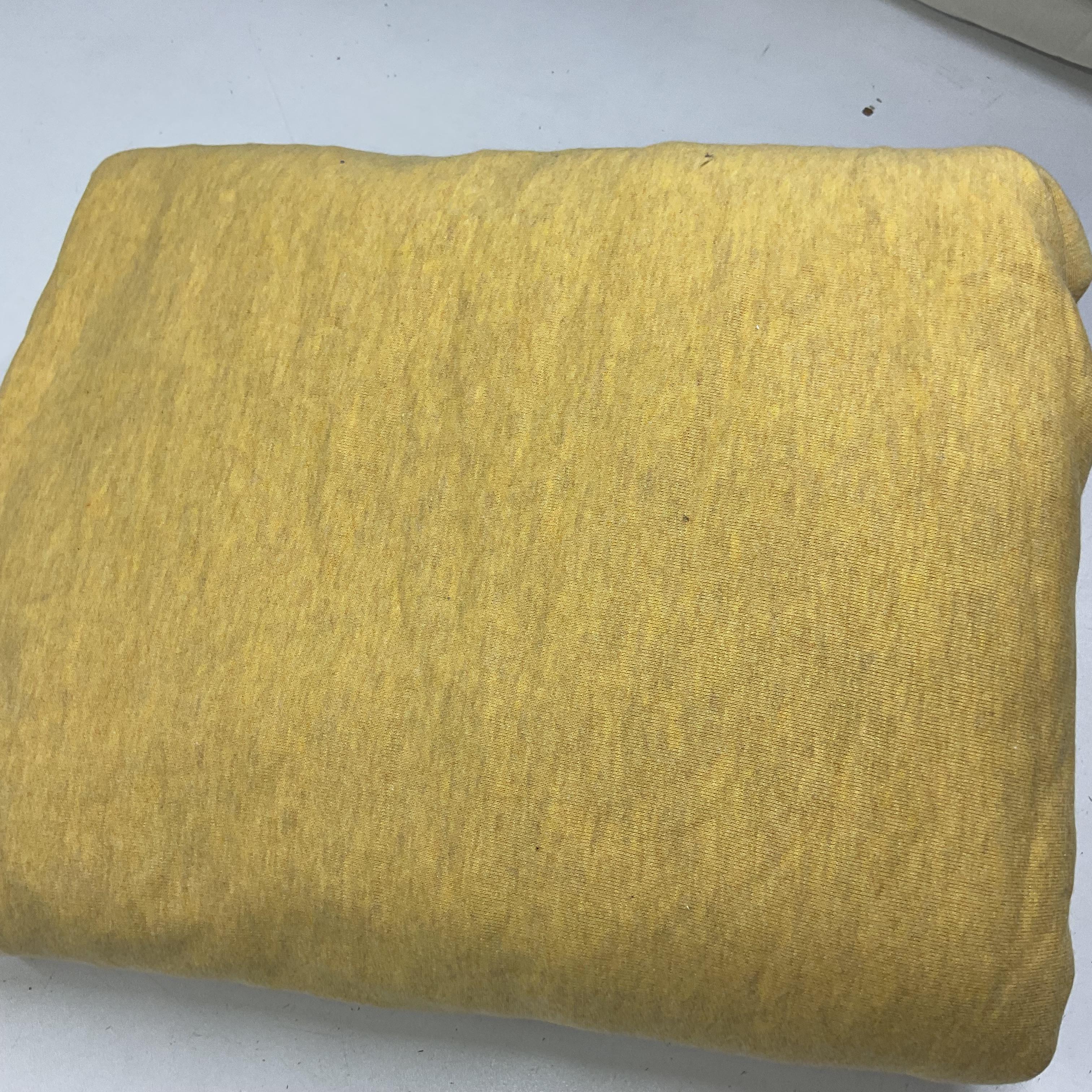 Defolu Kırçıllı Sarı Üç İplik Penye Kumaş 1800 gr