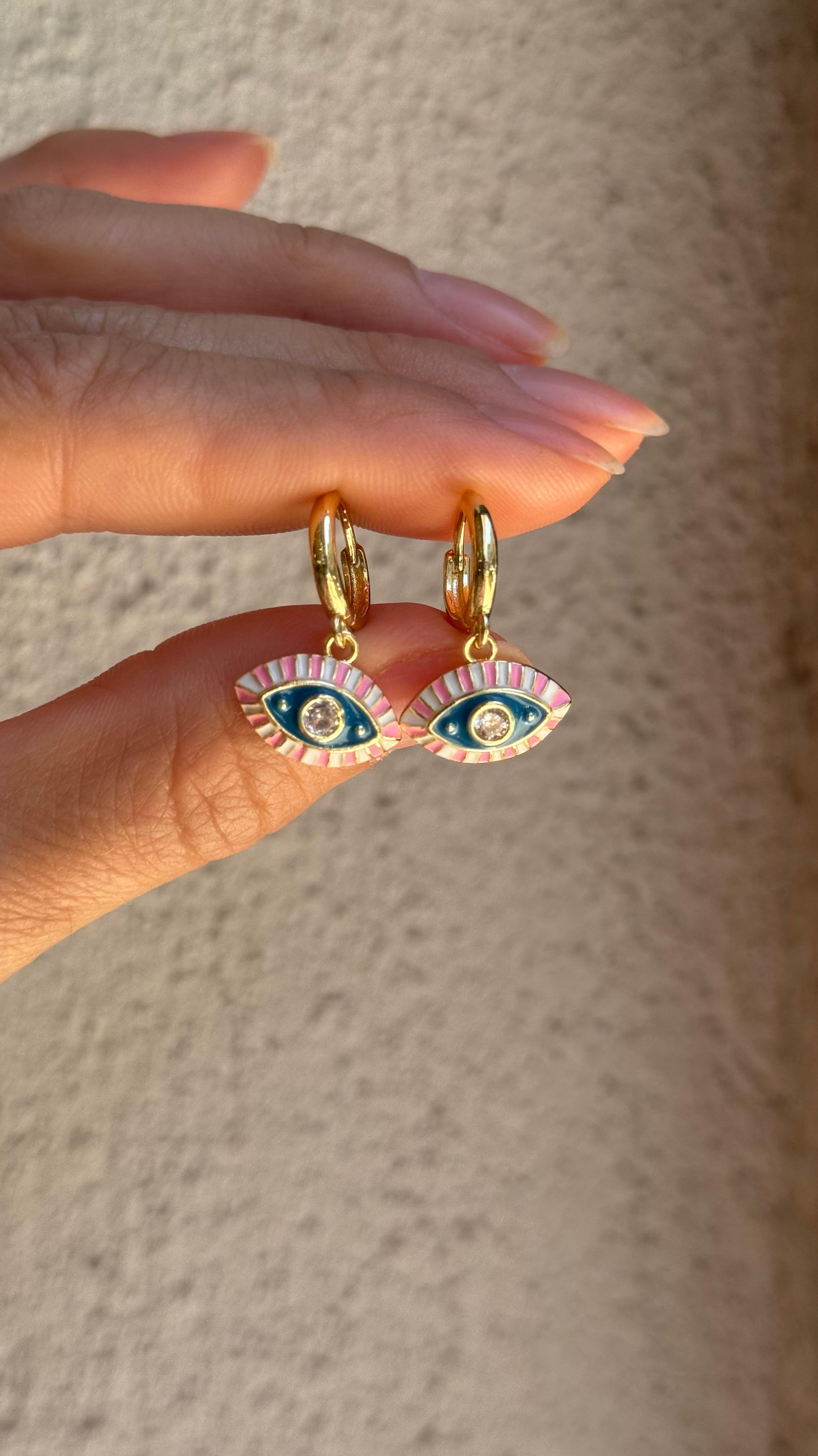 Pembe çizgili göz küpe