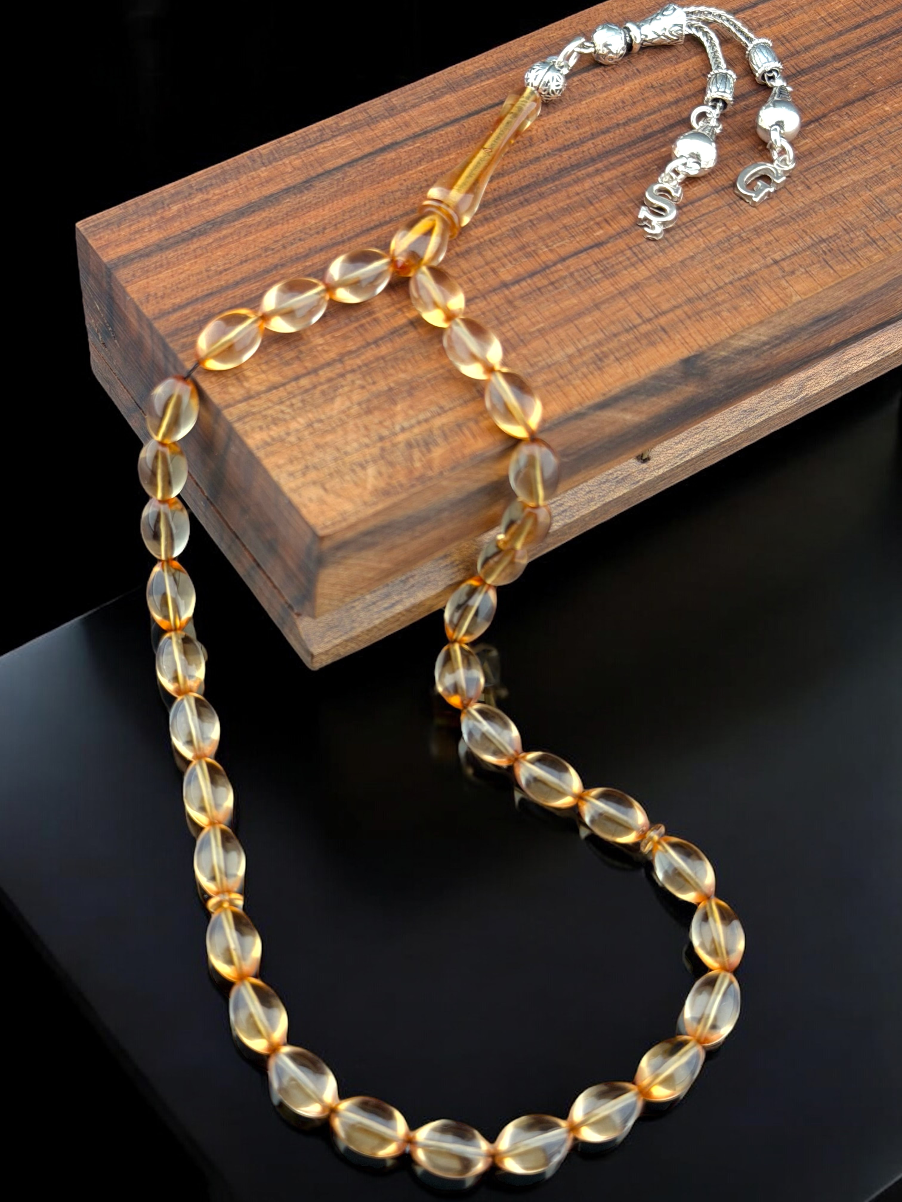 Şeffaf Tonda Harfli Alpaka Püsküllü Ateş Kehribarı Tesbih