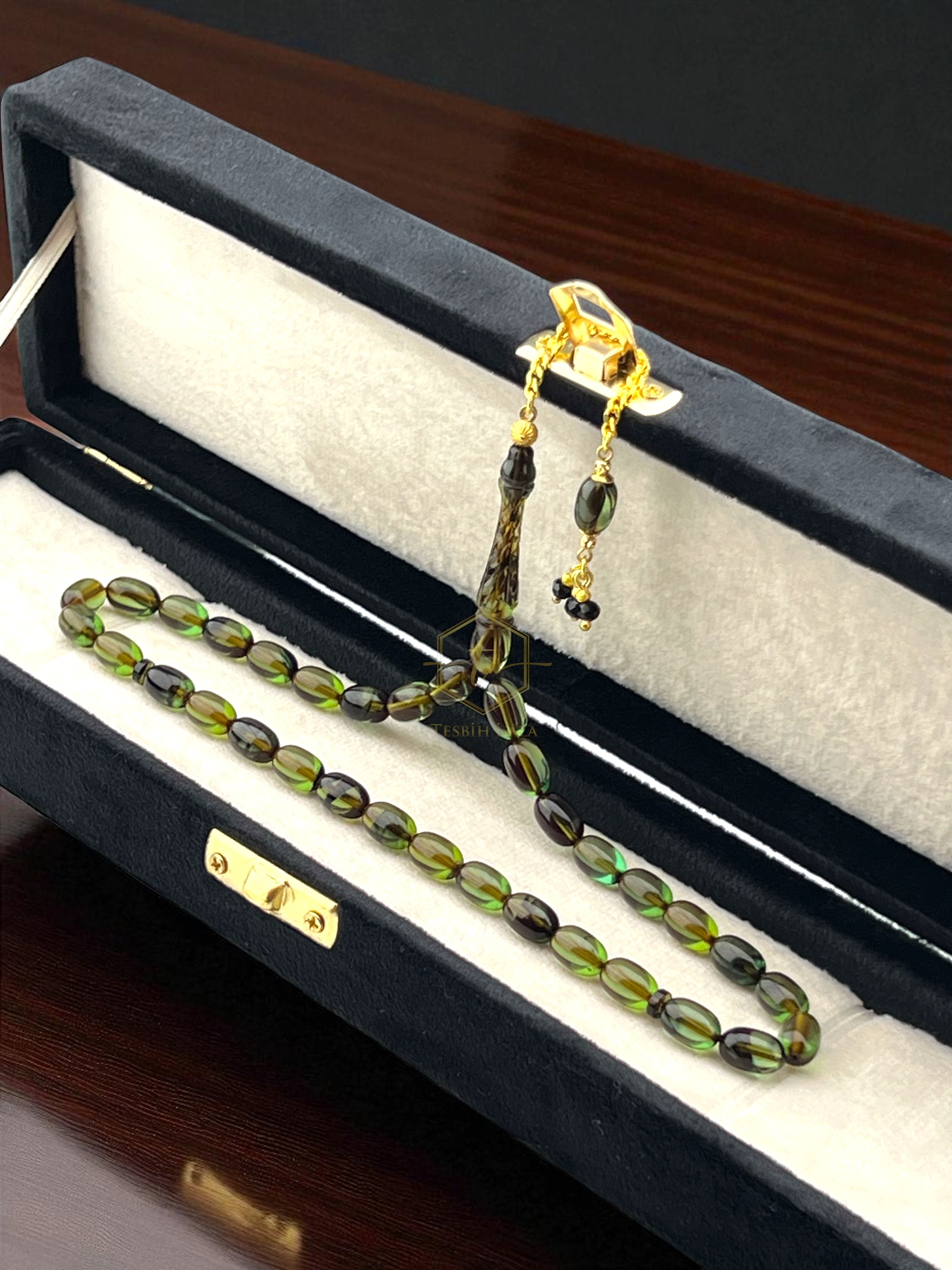 Yeşil-Siyah Hareli Gold Dizayn Gümüş Püsküllü Ateş Kehribarı Tesbih