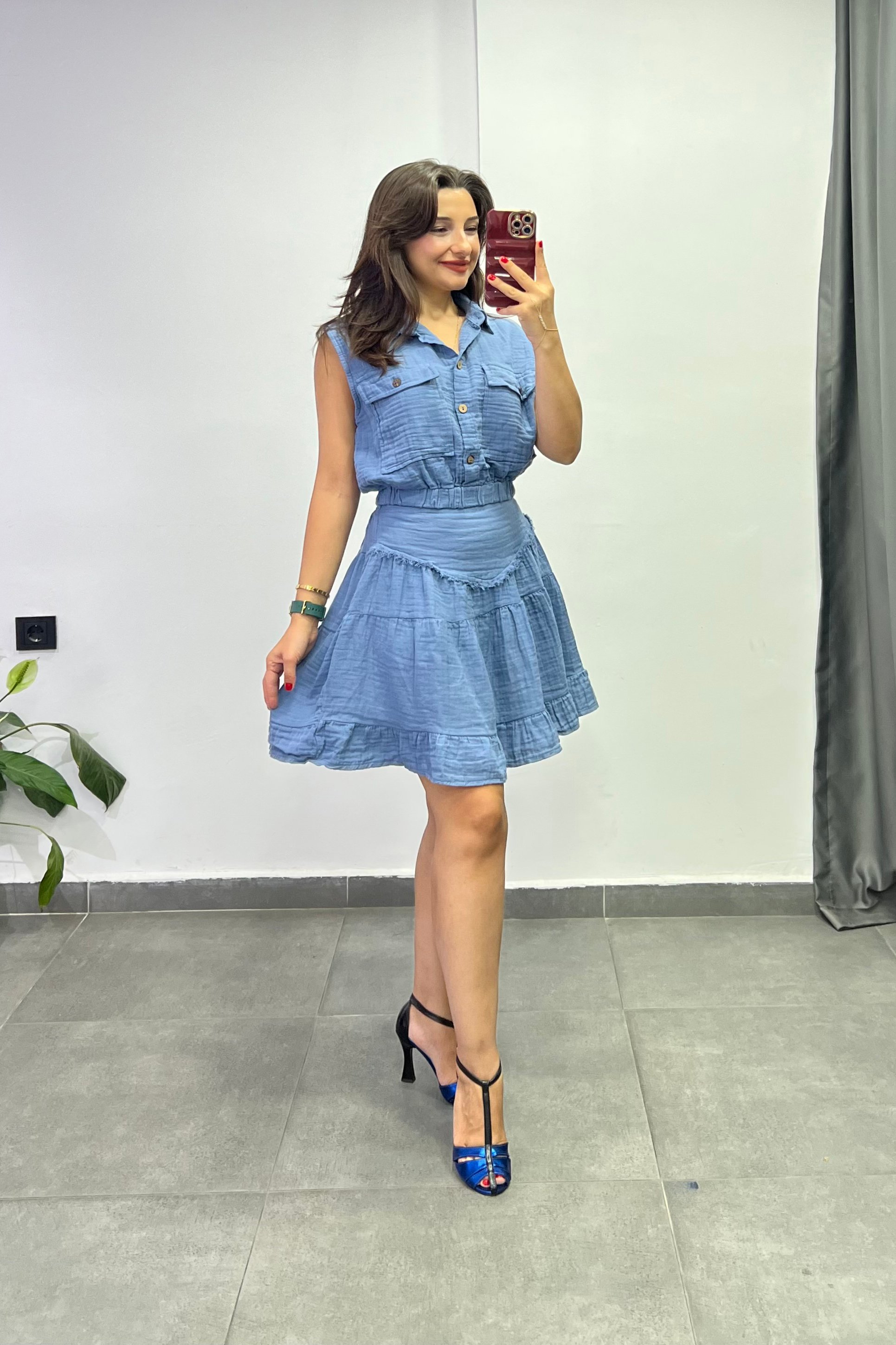 Beli Lastikli Cep Detaylı Kolsuz Müslin Bluz - MAVI