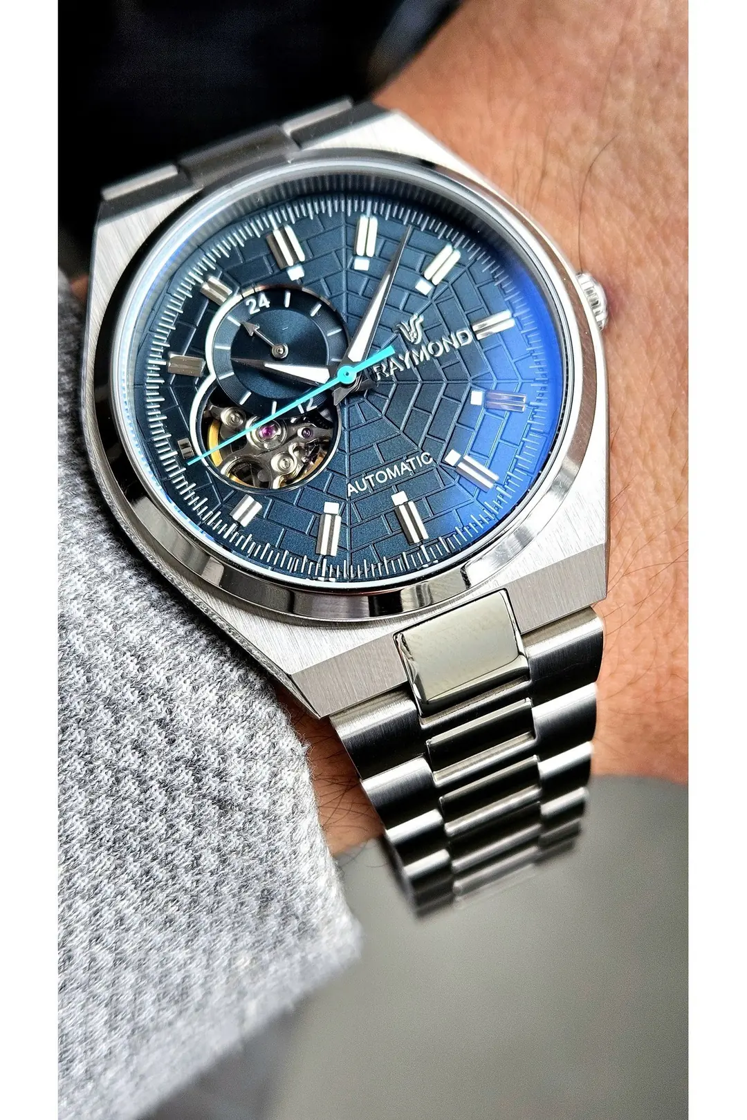RYM-250424 RAYMOND ERKEK OTOMATİK SAAT - PASLANMAZ ÇELİK VE SAFİR
